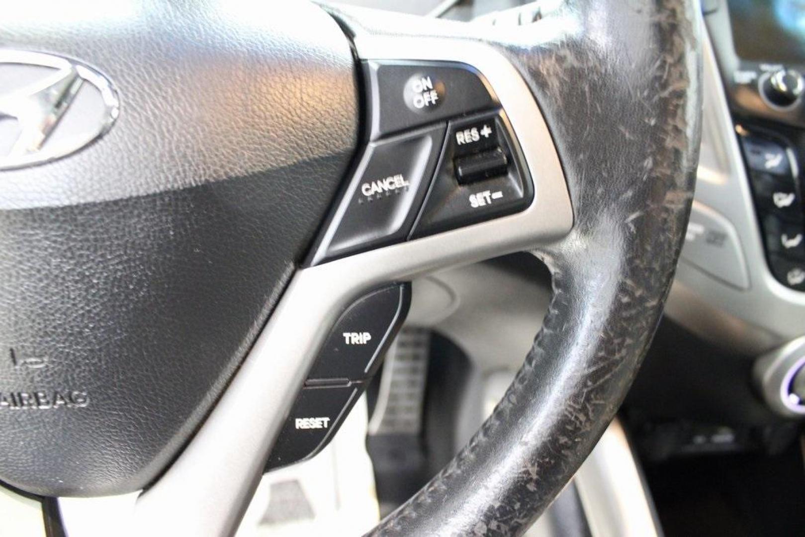 2012 Ultra Black /Gray Hyundai Veloster Base (KMHTC6ADXCU) with an 1.6L 4-Cylinder DGI DOHC engine, Automatic transmission, located at 15300 Midway Rd., Addison, TX, 75001, (972) 702-0011, 32.958321, -96.838074 - Introducing the 2012 Hyundai Veloster, now available at Midway Auto Group in Addison, Texas. This innovative hatchback combines sporty design, advanced technology, and impressive fuel efficiency, making it an excellent choice for drivers seeking both style and practicality.<br><br>Key Features:<br>< - Photo#22