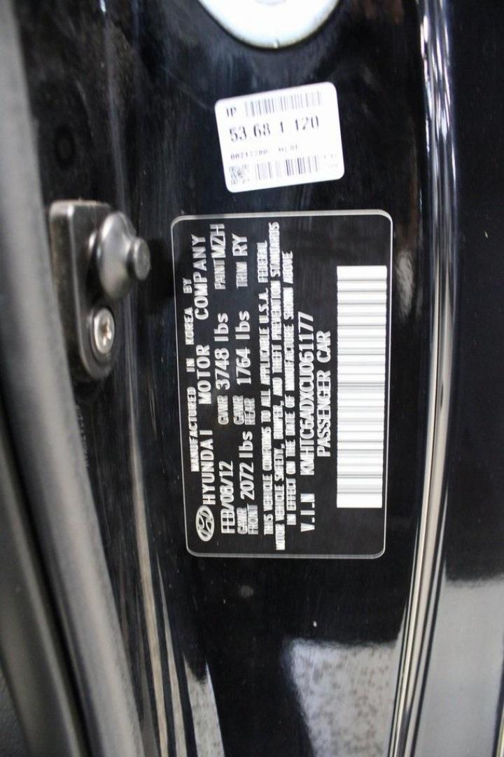 2012 Ultra Black /Gray Hyundai Veloster Base (KMHTC6ADXCU) with an 1.6L 4-Cylinder DGI DOHC engine, Automatic transmission, located at 15300 Midway Rd., Addison, TX, 75001, (972) 702-0011, 32.958321, -96.838074 - Introducing the 2012 Hyundai Veloster, now available at Midway Auto Group in Addison, Texas. This innovative hatchback combines sporty design, advanced technology, and impressive fuel efficiency, making it an excellent choice for drivers seeking both style and practicality.<br><br>Key Features:<br>< - Photo#28