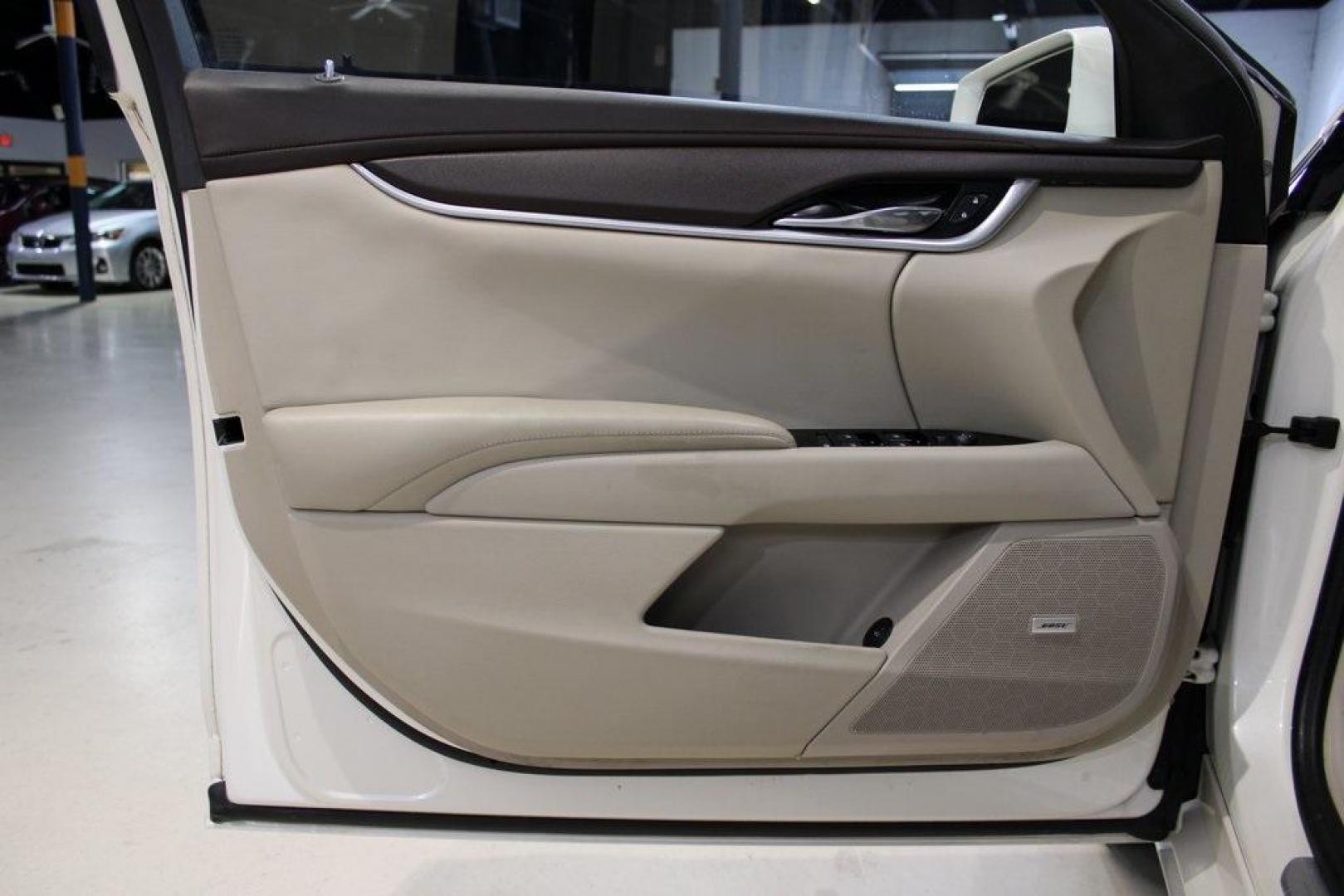 2013 White Diamond Tricoat /Shale/Cocoa Cadillac XTS Base (2G61N5S32D9) with an 3.6L V6 DGI DOHC VVT engine, Automatic transmission, located at 15300 Midway Rd., Addison, TX, 75001, (972) 702-0011, 32.958321, -96.838074 - Introducing the 2013 Cadillac XTS Luxury Collection, now available at Midway Auto Group in Addison, Texas. This full-size luxury sedan seamlessly combines sophisticated design, advanced technology, and a powerful performance, offering an exceptional driving experience for those who demand elegance a - Photo#24