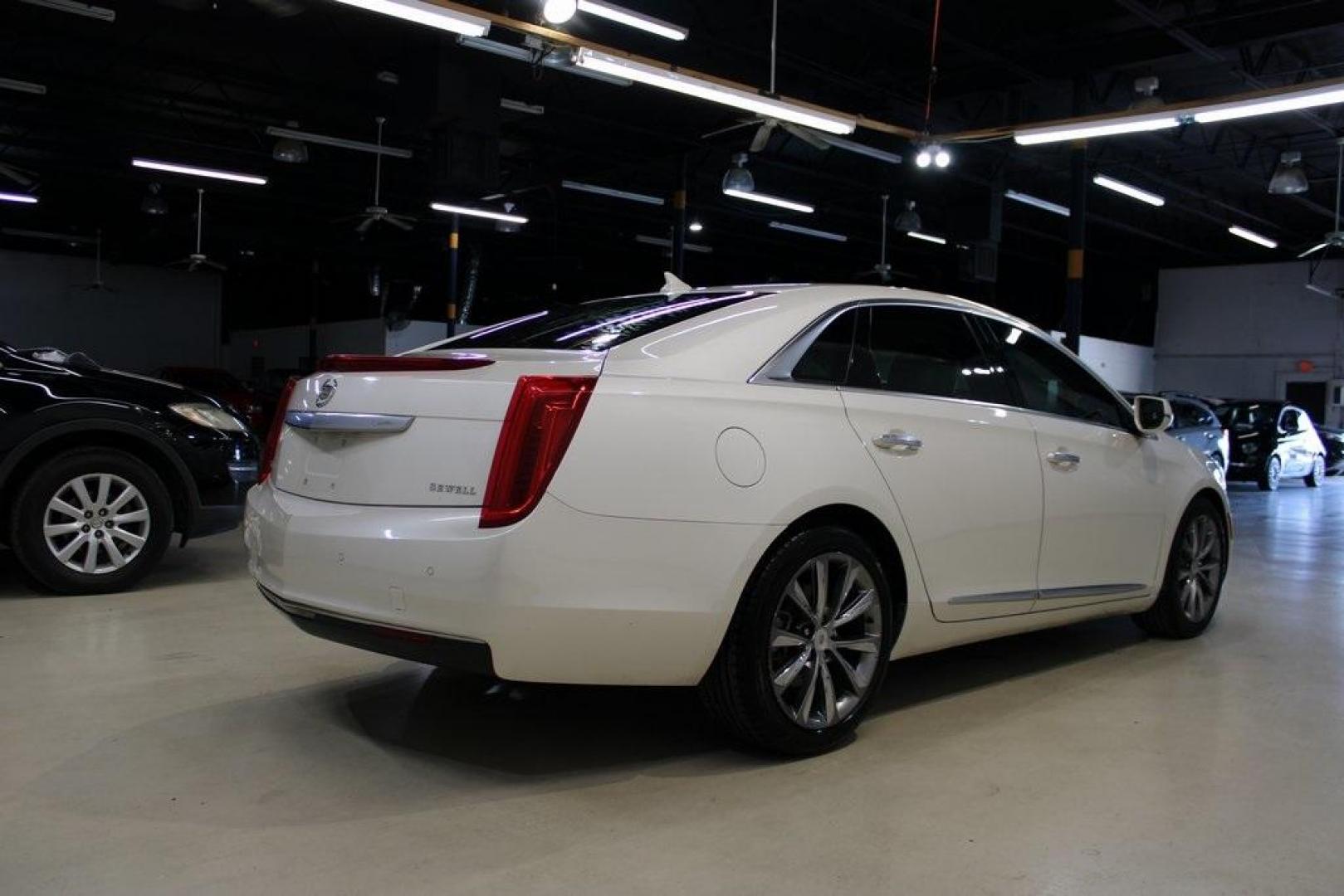 2013 White Diamond Tricoat /Shale/Cocoa Cadillac XTS Base (2G61N5S32D9) with an 3.6L V6 DGI DOHC VVT engine, Automatic transmission, located at 15300 Midway Rd., Addison, TX, 75001, (972) 702-0011, 32.958321, -96.838074 - Introducing the 2013 Cadillac XTS Luxury Collection, now available at Midway Auto Group in Addison, Texas. This full-size luxury sedan seamlessly combines sophisticated design, advanced technology, and a powerful performance, offering an exceptional driving experience for those who demand elegance a - Photo#2