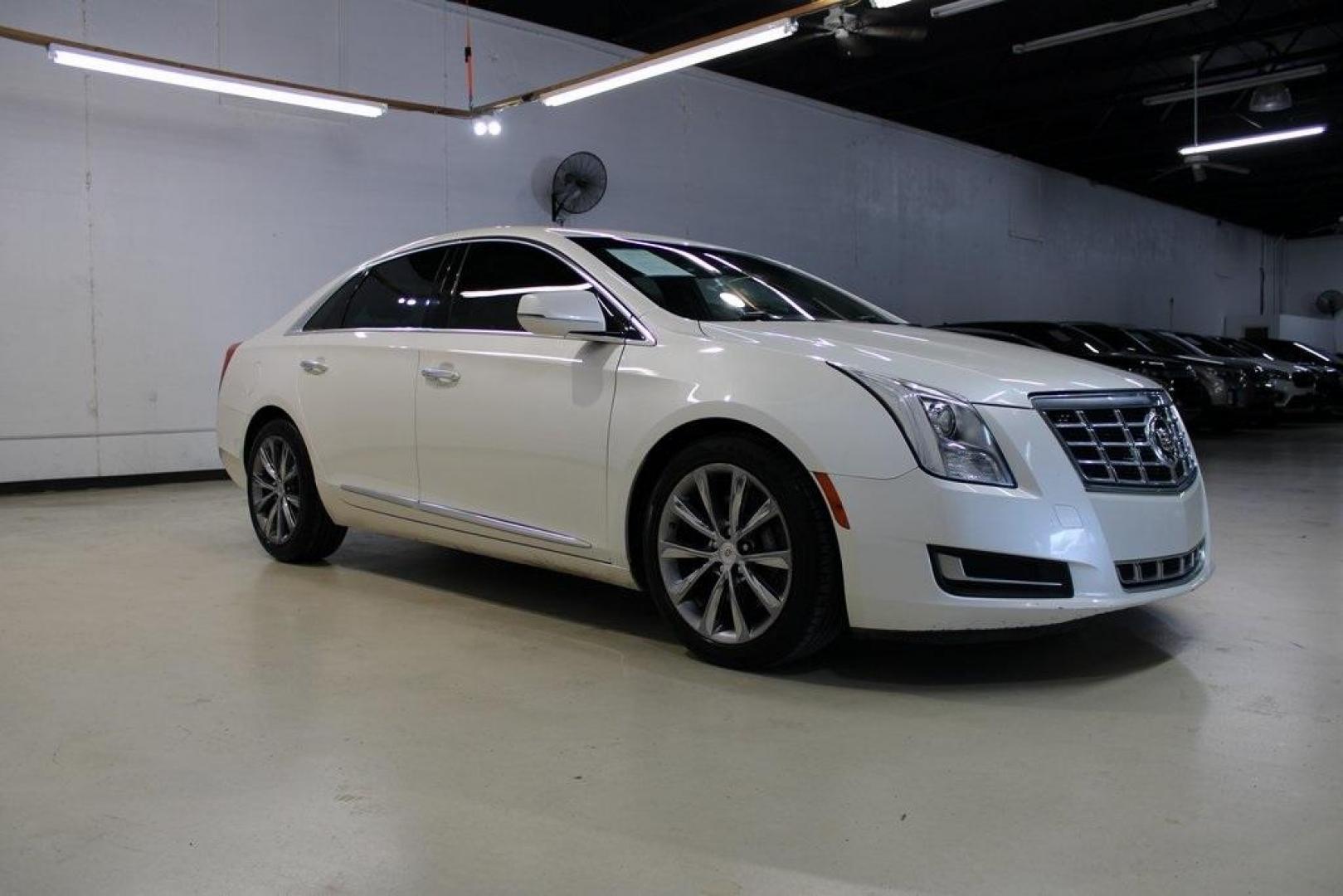 2013 White Diamond Tricoat /Shale/Cocoa Cadillac XTS Base (2G61N5S32D9) with an 3.6L V6 DGI DOHC VVT engine, Automatic transmission, located at 15300 Midway Rd., Addison, TX, 75001, (972) 702-0011, 32.958321, -96.838074 - Introducing the 2013 Cadillac XTS Luxury Collection, now available at Midway Auto Group in Addison, Texas. This full-size luxury sedan seamlessly combines sophisticated design, advanced technology, and a powerful performance, offering an exceptional driving experience for those who demand elegance a - Photo#6