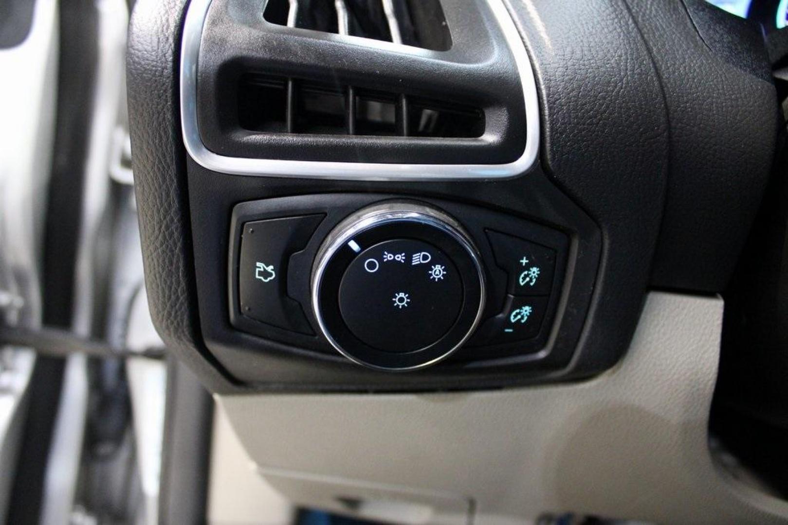 2014 Ingot Silver /Medium Light Stone Ford Focus Electric Base (1FADP3R42EL) with an 107kW Electric Motor engine, Automatic transmission, located at 15300 Midway Rd., Addison, TX, 75001, (972) 702-0011, 32.958321, -96.838074 - Introducing the 2014 Ford Focus Electric, now available at Midway Auto Group in Addison, Texas. This eco-friendly hatchback combines zero-emission performance with modern features, making it an excellent choice for environmentally conscious drivers seeking efficiency without compromising on style.<b - Photo#25