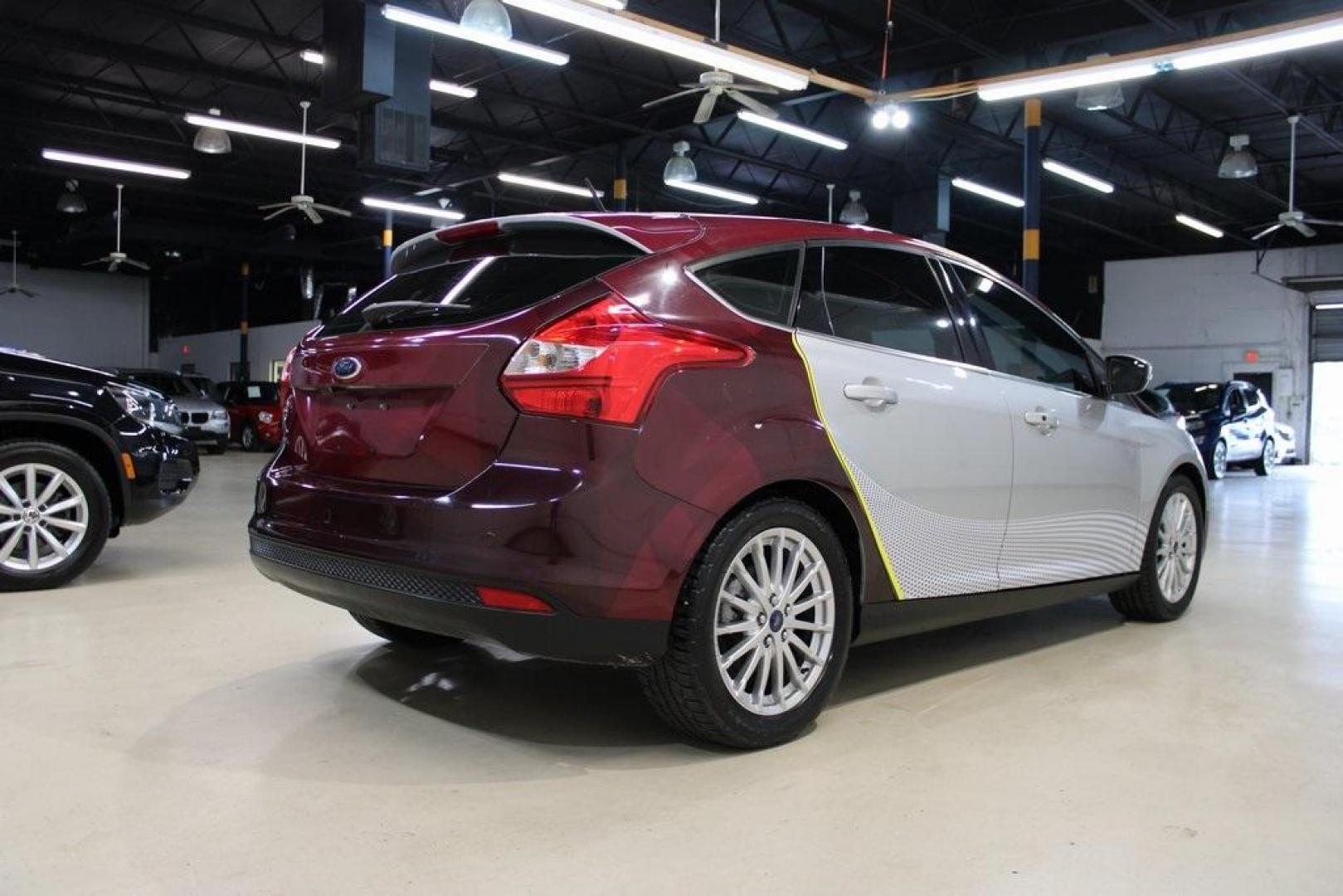 2014 Ingot Silver /Medium Light Stone Ford Focus Electric Base (1FADP3R42EL) with an 107kW Electric Motor engine, Automatic transmission, located at 15300 Midway Rd., Addison, TX, 75001, (972) 702-0011, 32.958321, -96.838074 - Introducing the 2014 Ford Focus Electric, now available at Midway Auto Group in Addison, Texas. This eco-friendly hatchback combines zero-emission performance with modern features, making it an excellent choice for environmentally conscious drivers seeking efficiency without compromising on style.<b - Photo#2