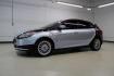 2014 Ingot Silver /Medium Light Stone Ford Focus Electric Base (1FADP3R42EL) with an 107kW Electric Motor engine, Automatic transmission, located at 15300 Midway Rd., Addison, TX, 75001, (972) 702-0011, 32.958321, -96.838074 - Introducing the 2014 Ford Focus Electric, now available at Midway Auto Group in Addison, Texas. This eco-friendly hatchback combines zero-emission performance with modern features, making it an excellent choice for environmentally conscious drivers seeking efficiency without compromising on style.<b - Photo#4