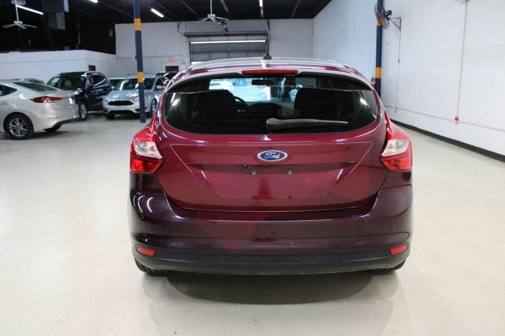 2014 Ingot Silver /Medium Light Stone Ford Focus Electric Base (1FADP3R42EL) with an 107kW Electric Motor engine, Automatic transmission, located at 15300 Midway Rd., Addison, TX, 75001, (972) 702-0011, 32.958321, -96.838074 - Introducing the 2014 Ford Focus Electric, now available at Midway Auto Group in Addison, Texas. This eco-friendly hatchback combines zero-emission performance with modern features, making it an excellent choice for environmentally conscious drivers seeking efficiency without compromising on style.<b - Photo#7