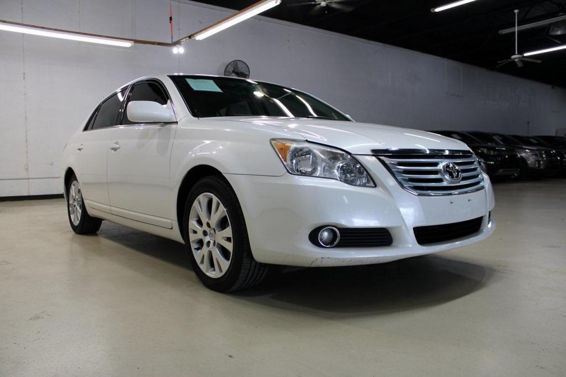 2010 Blizzard Pearl /Ivory Toyota Avalon XLS (4T1BK3DB1AU) with an 3.5L V6 SMPI DOHC engine, Automatic transmission, located at 15300 Midway Rd., Addison, TX, 75001, (972) 702-0011, 32.958321, -96.838074 - HOME OF THE NO HAGGLE PRICE - WHOLESALE PRICES TO THE PUBLIC!! Avalon XLS, 4D Sedan, 3.5L V6 SMPI DOHC, 6-Speed Automatic Electronic with Overdrive, FWD, White, Leather.<br><br>White 2010 Toyota Avalon XLS<br><br>Recent Arrival! 19/28 City/Highway MPG<br><br>Awards:<br> * 2010 KBB.com 10 Most Comfo - Photo #1