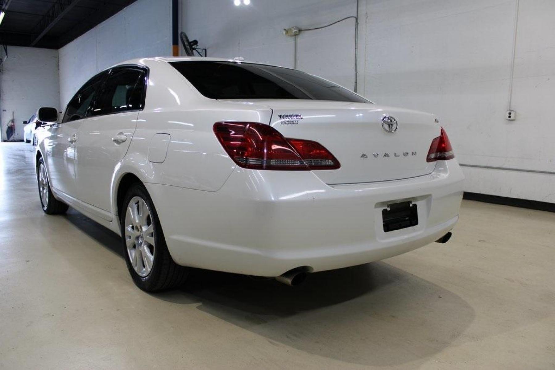 2010 Blizzard Pearl /Ivory Toyota Avalon XLS (4T1BK3DB1AU) with an 3.5L V6 SMPI DOHC engine, Automatic transmission, located at 15300 Midway Rd., Addison, TX, 75001, (972) 702-0011, 32.958321, -96.838074 - HOME OF THE NO HAGGLE PRICE - WHOLESALE PRICES TO THE PUBLIC!! Avalon XLS, 4D Sedan, 3.5L V6 SMPI DOHC, 6-Speed Automatic Electronic with Overdrive, FWD, White, Leather.<br><br>White 2010 Toyota Avalon XLS<br><br>Recent Arrival! 19/28 City/Highway MPG<br><br>Awards:<br> * 2010 KBB.com 10 Most Comfo - Photo #3