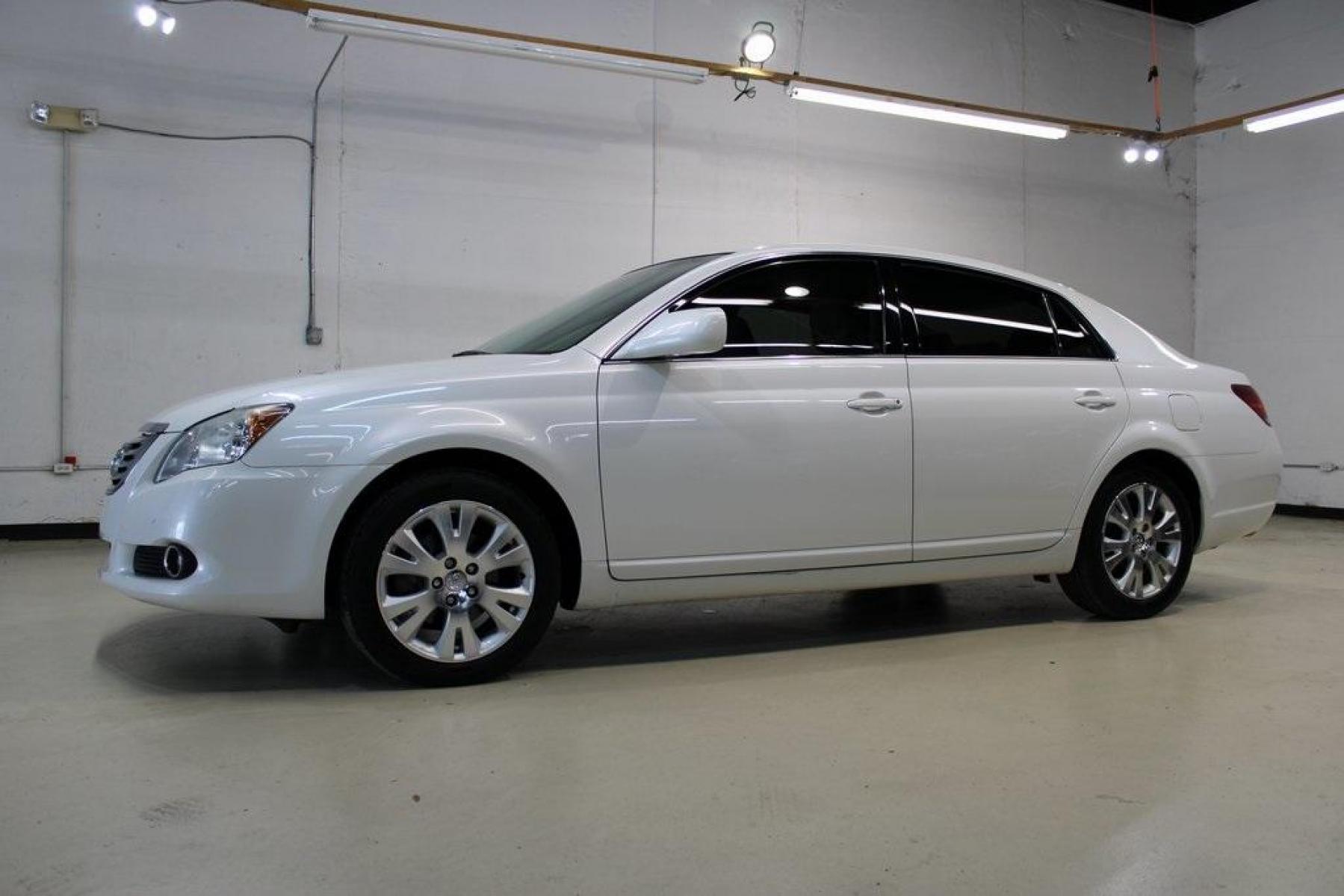 2010 Blizzard Pearl /Ivory Toyota Avalon XLS (4T1BK3DB1AU) with an 3.5L V6 SMPI DOHC engine, Automatic transmission, located at 15300 Midway Rd., Addison, TX, 75001, (972) 702-0011, 32.958321, -96.838074 - HOME OF THE NO HAGGLE PRICE - WHOLESALE PRICES TO THE PUBLIC!! Avalon XLS, 4D Sedan, 3.5L V6 SMPI DOHC, 6-Speed Automatic Electronic with Overdrive, FWD, White, Leather.<br><br>White 2010 Toyota Avalon XLS<br><br>Recent Arrival! 19/28 City/Highway MPG<br><br>Awards:<br> * 2010 KBB.com 10 Most Comfo - Photo #4