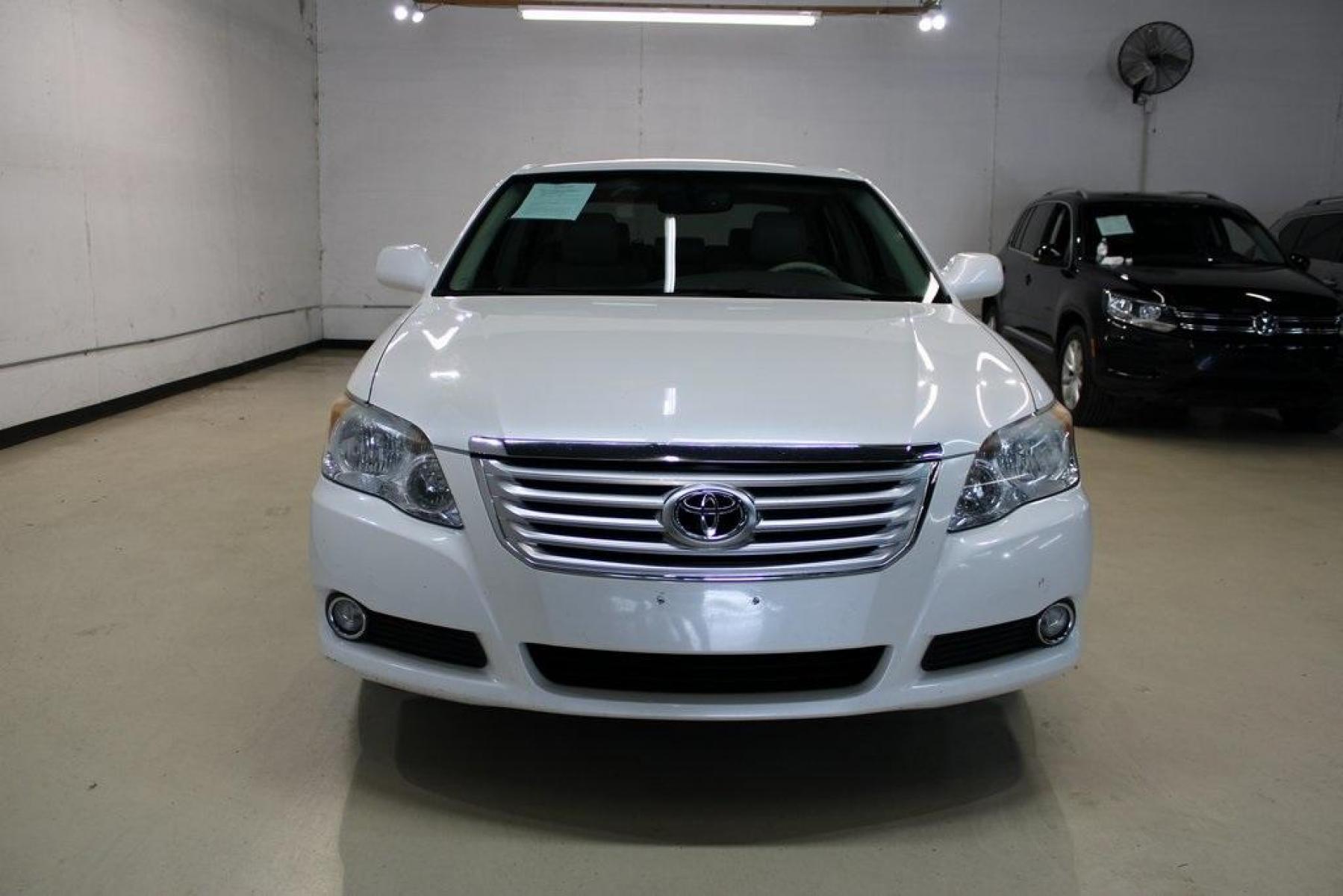 2010 Blizzard Pearl /Ivory Toyota Avalon XLS (4T1BK3DB1AU) with an 3.5L V6 SMPI DOHC engine, Automatic transmission, located at 15300 Midway Rd., Addison, TX, 75001, (972) 702-0011, 32.958321, -96.838074 - HOME OF THE NO HAGGLE PRICE - WHOLESALE PRICES TO THE PUBLIC!! Avalon XLS, 4D Sedan, 3.5L V6 SMPI DOHC, 6-Speed Automatic Electronic with Overdrive, FWD, White, Leather.<br><br>White 2010 Toyota Avalon XLS<br><br>Recent Arrival! 19/28 City/Highway MPG<br><br>Awards:<br> * 2010 KBB.com 10 Most Comfo - Photo #5