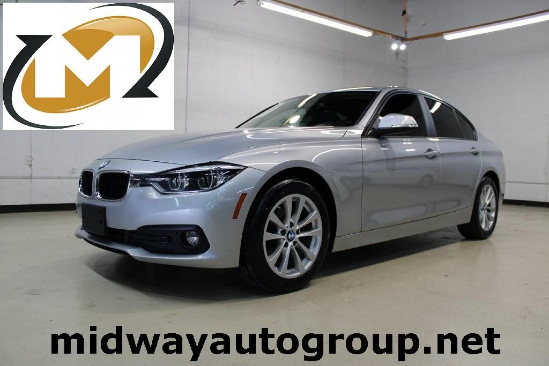 2018 Glacier Silver Metallic /Black BMW 3 Series 320i (WBA8E1G52JN) with an 2.0L 4-Cylinder DOHC 16V TwinPower Turbo engine, Automatic transmission, located at 15300 Midway Rd., Addison, TX, 75001, (972) 702-0011, 32.958321, -96.838074 - Photo #0
