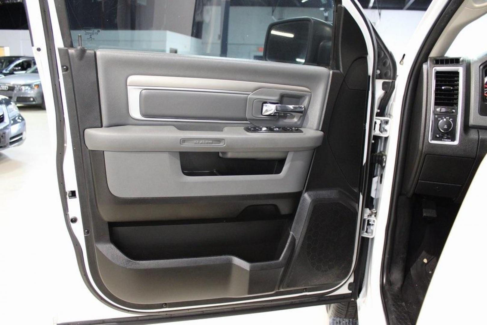 2019 Bright White Clearcoat /Black Ram 1500 Classic Big Horn (1C6RR6TT6KS) with an HEMI 5.7L V8 Multi Displacement VVT engine, Automatic transmission, located at 15300 Midway Rd., Addison, TX, 75001, (972) 702-0011, 32.958321, -96.838074 - HOME OF THE NO HAGGLE PRICE - WHOLESALE PRICES TO THE PUBLIC!! 1500 Classic Big Horn, 4D Crew Cab, HEMI 5.7L V8 Multi Displacement VVT, 8-Speed Automatic, RWD, Bright White Clearcoat, Black Cloth.<br><br>Bright White Clearcoat 2019 Ram 1500 Classic Big Horn<br><br>Recent Arrival!<br><br><br>At Midwa - Photo#27