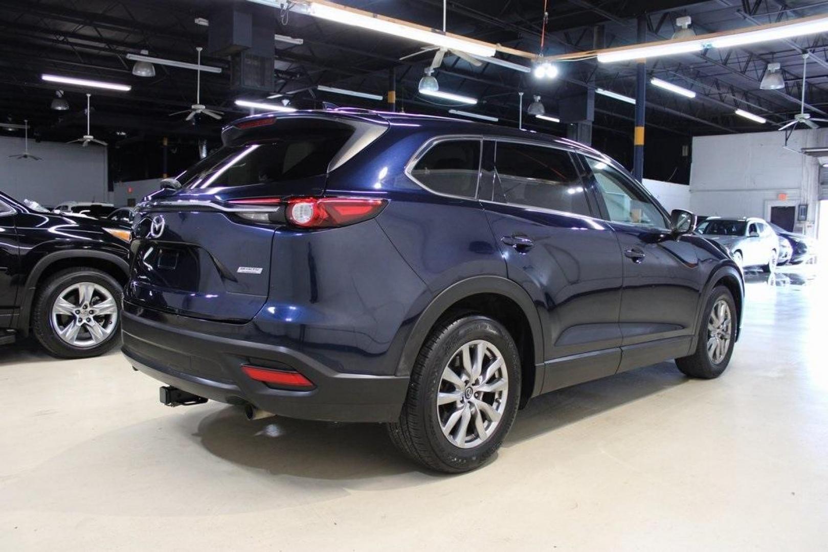 2019 Deep Crystal Blue Mica /Sand Mazda CX-9 Touring (JM3TCACY5K0) with an 2.5L 4-Cylinder engine, Automatic transmission, located at 15300 Midway Rd., Addison, TX, 75001, (972) 702-0011, 32.958321, -96.838074 - HOME OF THE NO HAGGLE PRICE - WHOLESALE PRICES TO THE PUBLIC!! CX-9 Touring, 4D Sport Utility, 2.5L 4-Cylinder, 6-Speed Automatic, FWD, Deep Crystal Blue Mica, Sand Leather.<br><br>Deep Crystal Blue Mica 2019 Mazda CX-9 Touring<br><br>Recent Arrival! 22/28 City/Highway MPG<br><br>Awards:<br> * 2019 - Photo#2