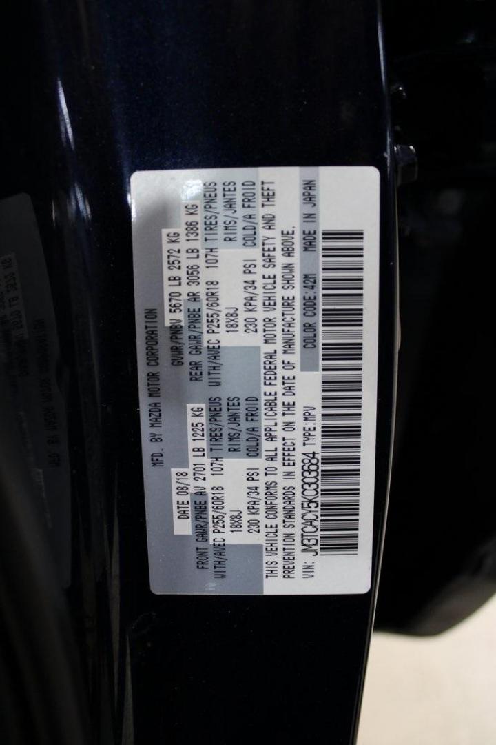 2019 Deep Crystal Blue Mica /Sand Mazda CX-9 Touring (JM3TCACY5K0) with an 2.5L 4-Cylinder engine, Automatic transmission, located at 15300 Midway Rd., Addison, TX, 75001, (972) 702-0011, 32.958321, -96.838074 - HOME OF THE NO HAGGLE PRICE - WHOLESALE PRICES TO THE PUBLIC!! CX-9 Touring, 4D Sport Utility, 2.5L 4-Cylinder, 6-Speed Automatic, FWD, Deep Crystal Blue Mica, Sand Leather.<br><br>Deep Crystal Blue Mica 2019 Mazda CX-9 Touring<br><br>Recent Arrival! 22/28 City/Highway MPG<br><br>Awards:<br> * 2019 - Photo#34