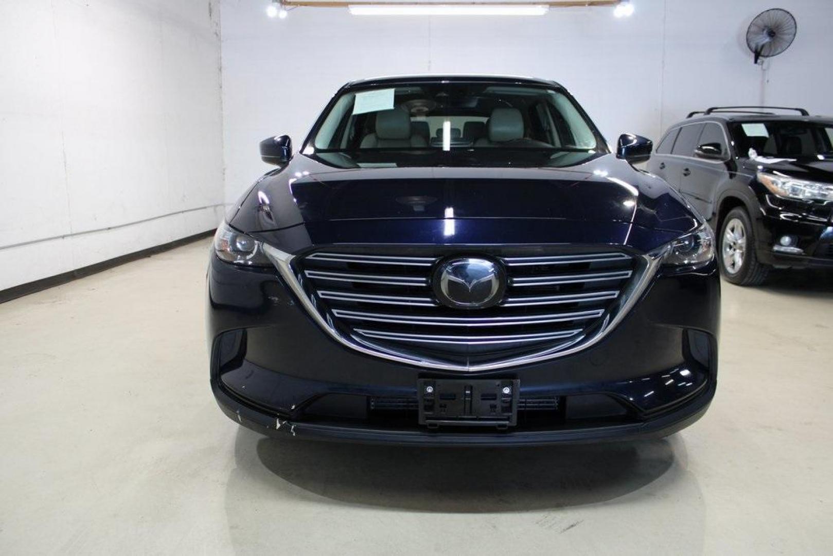 2019 Deep Crystal Blue Mica /Sand Mazda CX-9 Touring (JM3TCACY5K0) with an 2.5L 4-Cylinder engine, Automatic transmission, located at 15300 Midway Rd., Addison, TX, 75001, (972) 702-0011, 32.958321, -96.838074 - HOME OF THE NO HAGGLE PRICE - WHOLESALE PRICES TO THE PUBLIC!! CX-9 Touring, 4D Sport Utility, 2.5L 4-Cylinder, 6-Speed Automatic, FWD, Deep Crystal Blue Mica, Sand Leather.<br><br>Deep Crystal Blue Mica 2019 Mazda CX-9 Touring<br><br>Recent Arrival! 22/28 City/Highway MPG<br><br>Awards:<br> * 2019 - Photo#5