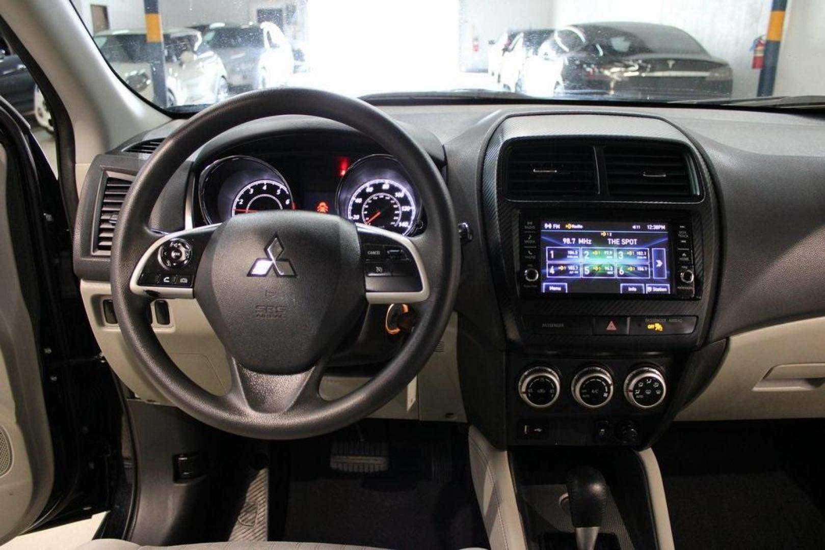 2021 Labrador Black Metallic /Gray Mitsubishi Outlander Sport 2.0 ES (JA4APUAU9MU) with an 2.0L I4 SMPI DOHC 16V LEV3-ULEV70 148hp engine, CVT transmission, located at 15300 Midway Rd., Addison, TX, 75001, (972) 702-0011, 32.958321, -96.838074 - HOME OF THE NO HAGGLE PRICE - WHOLESALE PRICES TO THE PUBLIC!! Outlander Sport 2.0 ES, 4D Sport Utility, 2.0L I4 SMPI DOHC 16V LEV3-ULEV70 148hp, CVT, FWD, Black, Gray Cloth.<br><br>Black 2021 Mitsubishi Outlander Sport 2.0 ES<br><br>Recent Arrival! 24/30 City/Highway MPG<br><br><br>At Midway Auto G - Photo#17