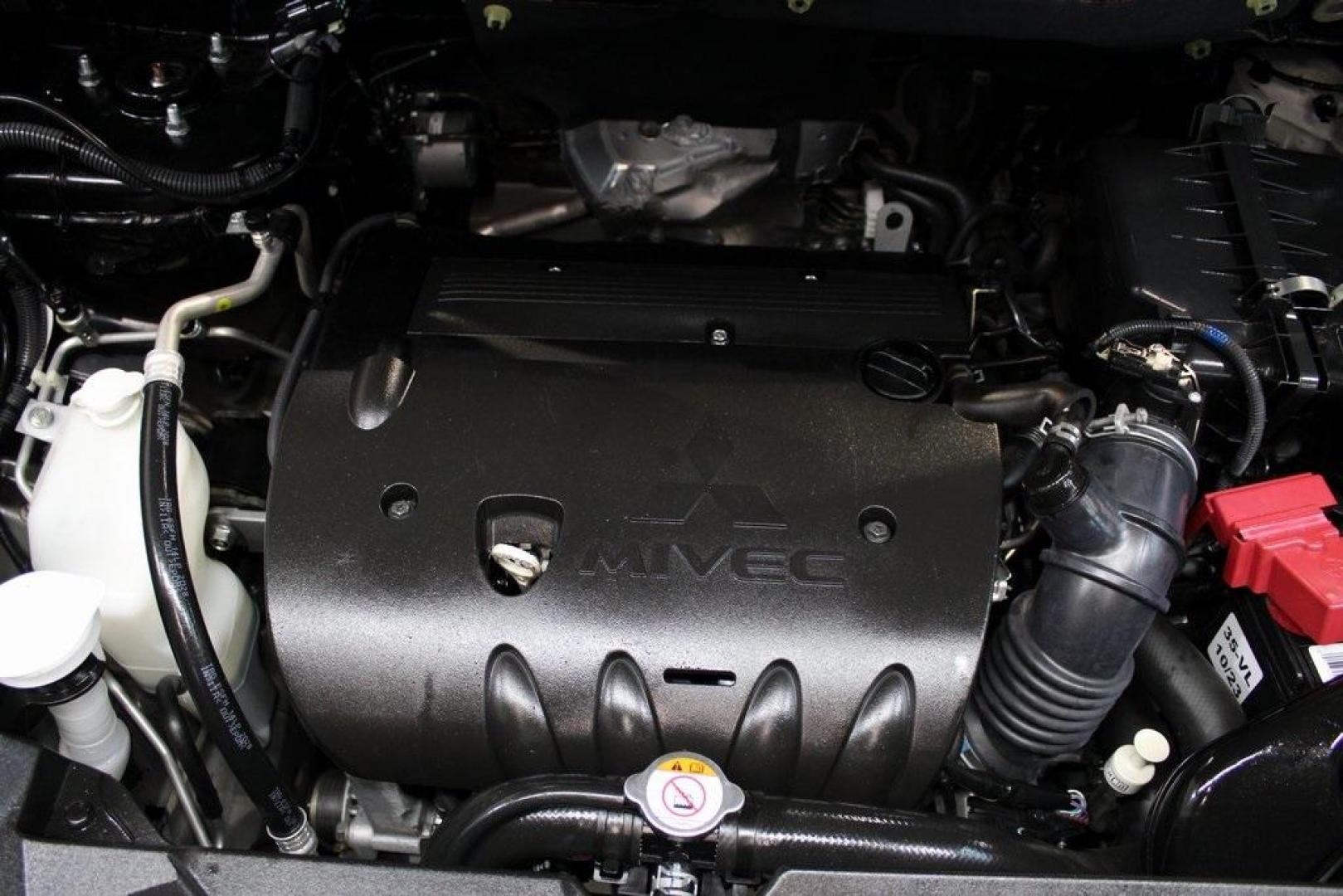 2021 Labrador Black Metallic /Gray Mitsubishi Outlander Sport 2.0 ES (JA4APUAU9MU) with an 2.0L I4 SMPI DOHC 16V LEV3-ULEV70 148hp engine, CVT transmission, located at 15300 Midway Rd., Addison, TX, 75001, (972) 702-0011, 32.958321, -96.838074 - HOME OF THE NO HAGGLE PRICE - WHOLESALE PRICES TO THE PUBLIC!! Outlander Sport 2.0 ES, 4D Sport Utility, 2.0L I4 SMPI DOHC 16V LEV3-ULEV70 148hp, CVT, FWD, Black, Gray Cloth.<br><br>Black 2021 Mitsubishi Outlander Sport 2.0 ES<br><br>Recent Arrival! 24/30 City/Highway MPG<br><br><br>At Midway Auto G - Photo#26