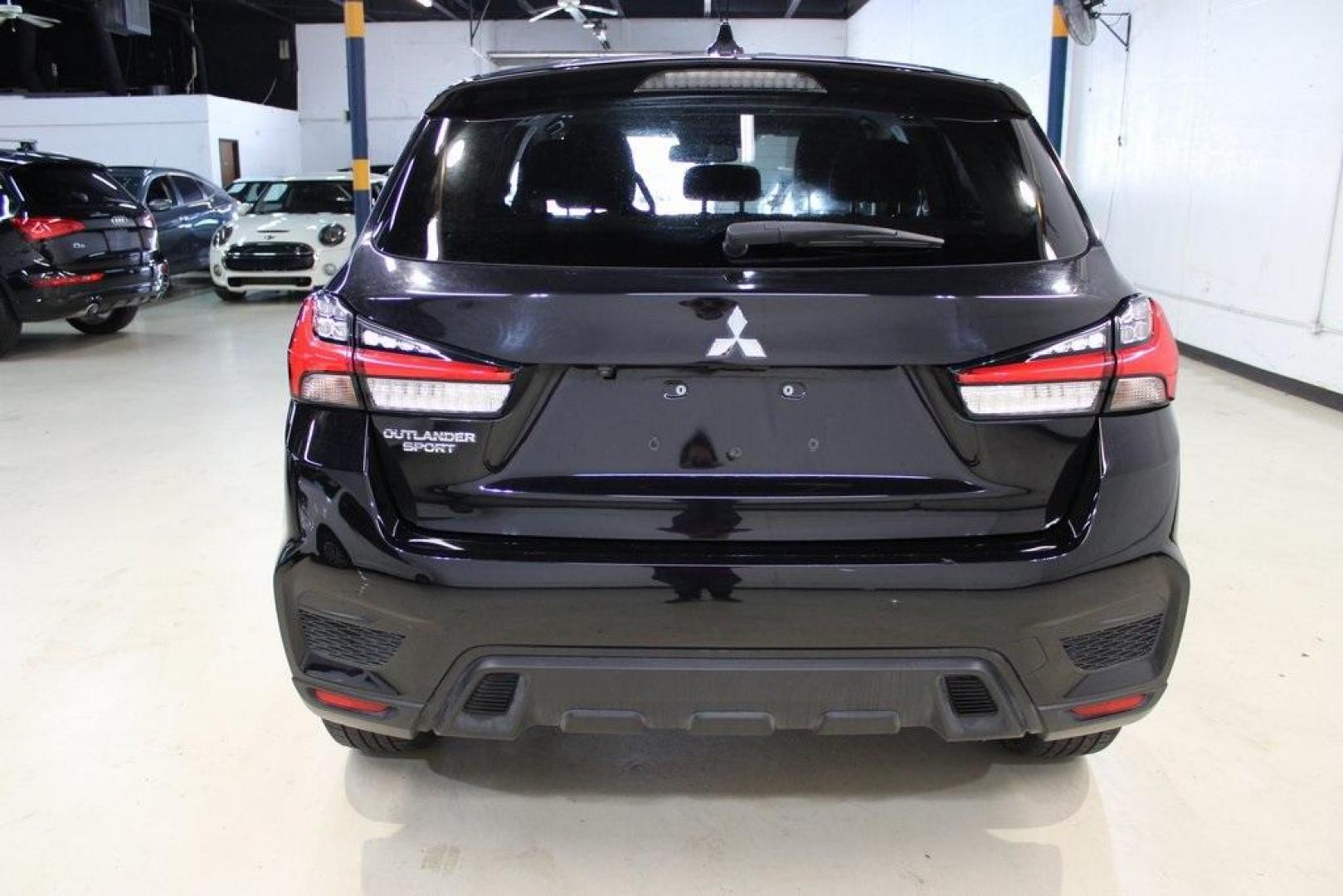 2021 Labrador Black Metallic /Gray Mitsubishi Outlander Sport 2.0 ES (JA4APUAU9MU) with an 2.0L I4 SMPI DOHC 16V LEV3-ULEV70 148hp engine, CVT transmission, located at 15300 Midway Rd., Addison, TX, 75001, (972) 702-0011, 32.958321, -96.838074 - HOME OF THE NO HAGGLE PRICE - WHOLESALE PRICES TO THE PUBLIC!! Outlander Sport 2.0 ES, 4D Sport Utility, 2.0L I4 SMPI DOHC 16V LEV3-ULEV70 148hp, CVT, FWD, Black, Gray Cloth.<br><br>Black 2021 Mitsubishi Outlander Sport 2.0 ES<br><br>Recent Arrival! 24/30 City/Highway MPG<br><br><br>At Midway Auto G - Photo#7