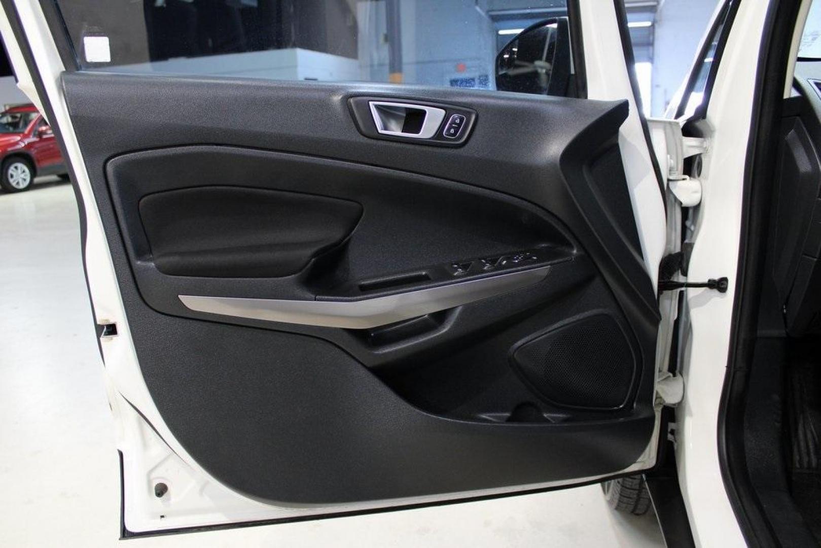 2019 Diamond White /Ebony Black Ford EcoSport SE (MAJ3S2GE8KC) with an EcoBoost 1.0L I3 GTDi DOHC Turbocharged VCT engine, Automatic transmission, located at 15300 Midway Rd., Addison, TX, 75001, (972) 702-0011, 32.958321, -96.838074 - HOME OF THE NO HAGGLE PRICE - WHOLESALE PRICES TO THE PUBLIC!! EcoSport SE, 4D Sport Utility, EcoBoost 1.0L I3 GTDi DOHC Turbocharged VCT, 6-Speed Automatic, FWD, Diamond White, Ebony Black Cloth.<br><br>Diamond White 2019 Ford EcoSport SE<br><br>Recent Arrival! 27/29 City/Highway MPG<br><br><br>At - Photo#21