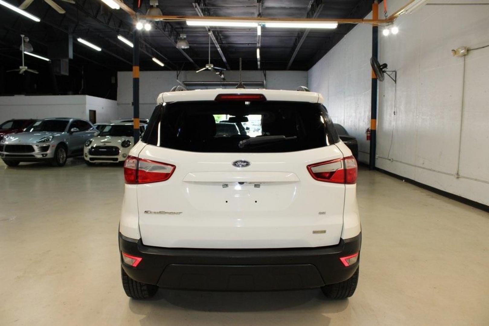 2019 Diamond White /Ebony Black Ford EcoSport SE (MAJ3S2GE8KC) with an EcoBoost 1.0L I3 GTDi DOHC Turbocharged VCT engine, Automatic transmission, located at 15300 Midway Rd., Addison, TX, 75001, (972) 702-0011, 32.958321, -96.838074 - HOME OF THE NO HAGGLE PRICE - WHOLESALE PRICES TO THE PUBLIC!! EcoSport SE, 4D Sport Utility, EcoBoost 1.0L I3 GTDi DOHC Turbocharged VCT, 6-Speed Automatic, FWD, Diamond White, Ebony Black Cloth.<br><br>Diamond White 2019 Ford EcoSport SE<br><br>Recent Arrival! 27/29 City/Highway MPG<br><br><br>At - Photo#7