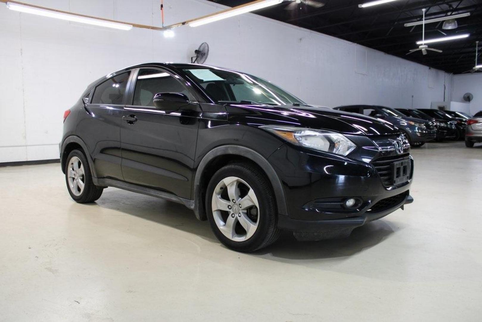 2016 Crystal Black Pearl Honda HR-V EX (3CZRU5G52GM) with an 1.8L I4 SOHC 16V i-VTEC engine, Manual transmission, located at 15300 Midway Rd., Addison, TX, 75001, (972) 702-0011, 32.958321, -96.838074 - Photo#6
