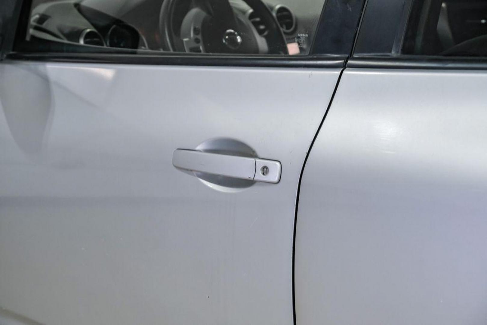 2009 Brilliant Silver Metallic /Gray Nissan Rogue SL (JN8AS58T49W) with an 2.5L 4-Cylinder DOHC 16V engine, CVT transmission, located at 15300 Midway Rd., Addison, TX, 75001, (972) 702-0011, 32.958321, -96.838074 - Photo#36