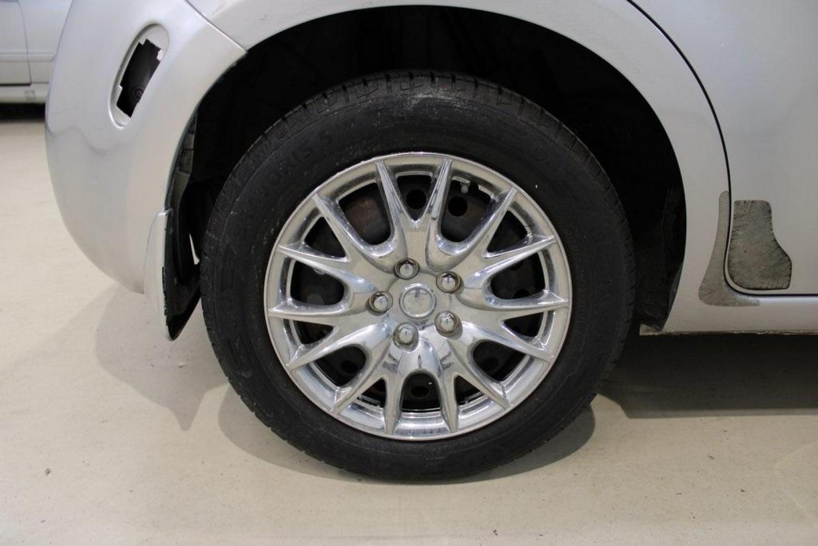 2011 Chrome Silver Metallic /Black Nissan Cube 1.8 S (JN8AZ2KRXBT) with an 1.8L 4-Cylinder DOHC 16V engine, CVT transmission, located at 15300 Midway Rd., Addison, TX, 75001, (972) 702-0011, 32.958321, -96.838074 - HOME OF THE NO HAGGLE PRICE - WHOLESALE PRICES TO THE PUBLIC!! Cube 1.8 S, 4D Wagon, 1.8L 4-Cylinder DOHC 16V, CVT with Xtronic, FWD, Chrome Silver Metallic, Black Cloth.<br><br>Chrome Silver Metallic 2011 Nissan Cube 1.8 S<br><br>27/31 City/Highway MPG<br><br>Awards:<br> * 2011 KBB.com Top 10 Cool - Photo#10