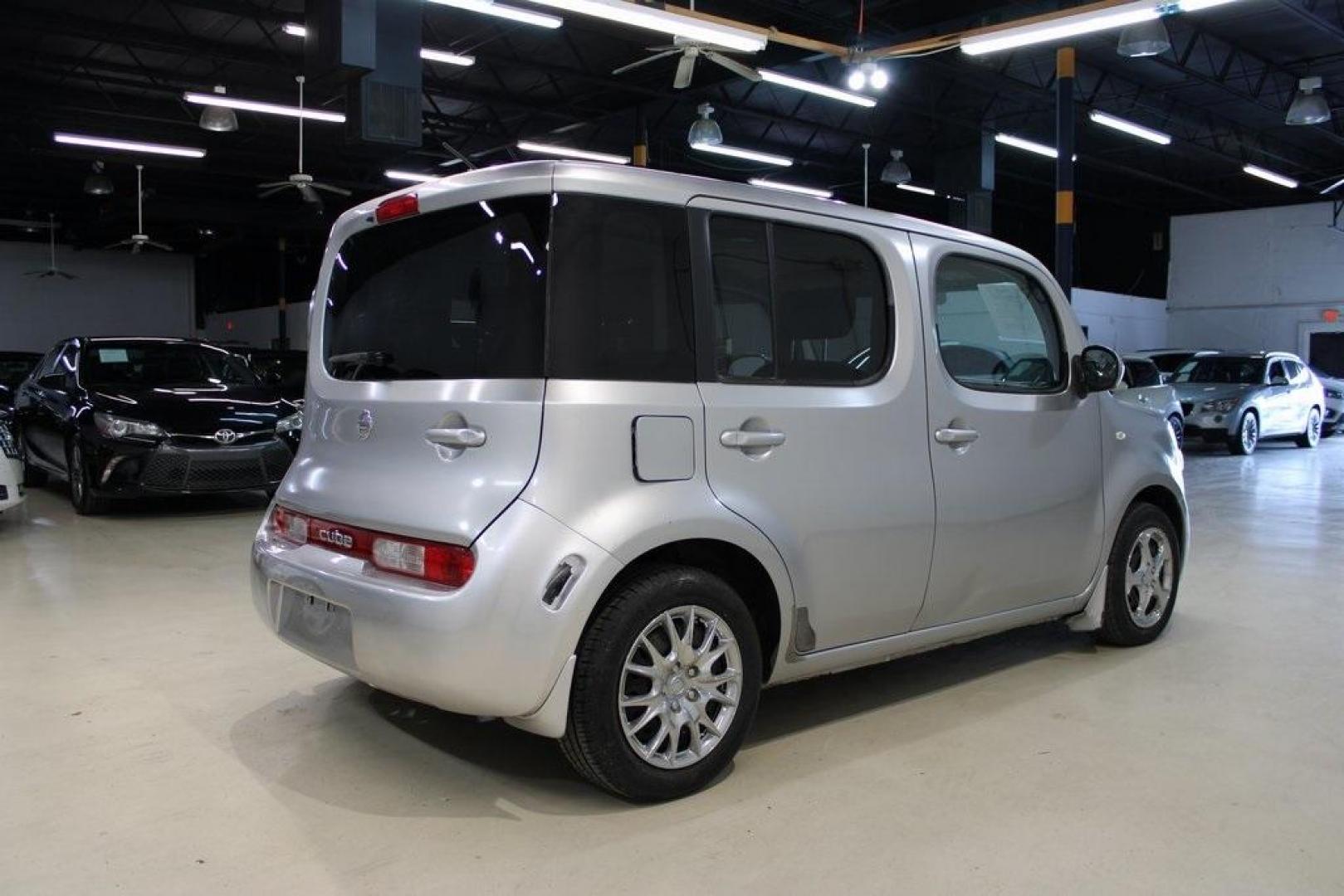 2011 Chrome Silver Metallic /Black Nissan Cube 1.8 S (JN8AZ2KRXBT) with an 1.8L 4-Cylinder DOHC 16V engine, CVT transmission, located at 15300 Midway Rd., Addison, TX, 75001, (972) 702-0011, 32.958321, -96.838074 - HOME OF THE NO HAGGLE PRICE - WHOLESALE PRICES TO THE PUBLIC!! Cube 1.8 S, 4D Wagon, 1.8L 4-Cylinder DOHC 16V, CVT with Xtronic, FWD, Chrome Silver Metallic, Black Cloth.<br><br>Chrome Silver Metallic 2011 Nissan Cube 1.8 S<br><br>27/31 City/Highway MPG<br><br>Awards:<br> * 2011 KBB.com Top 10 Cool - Photo#2