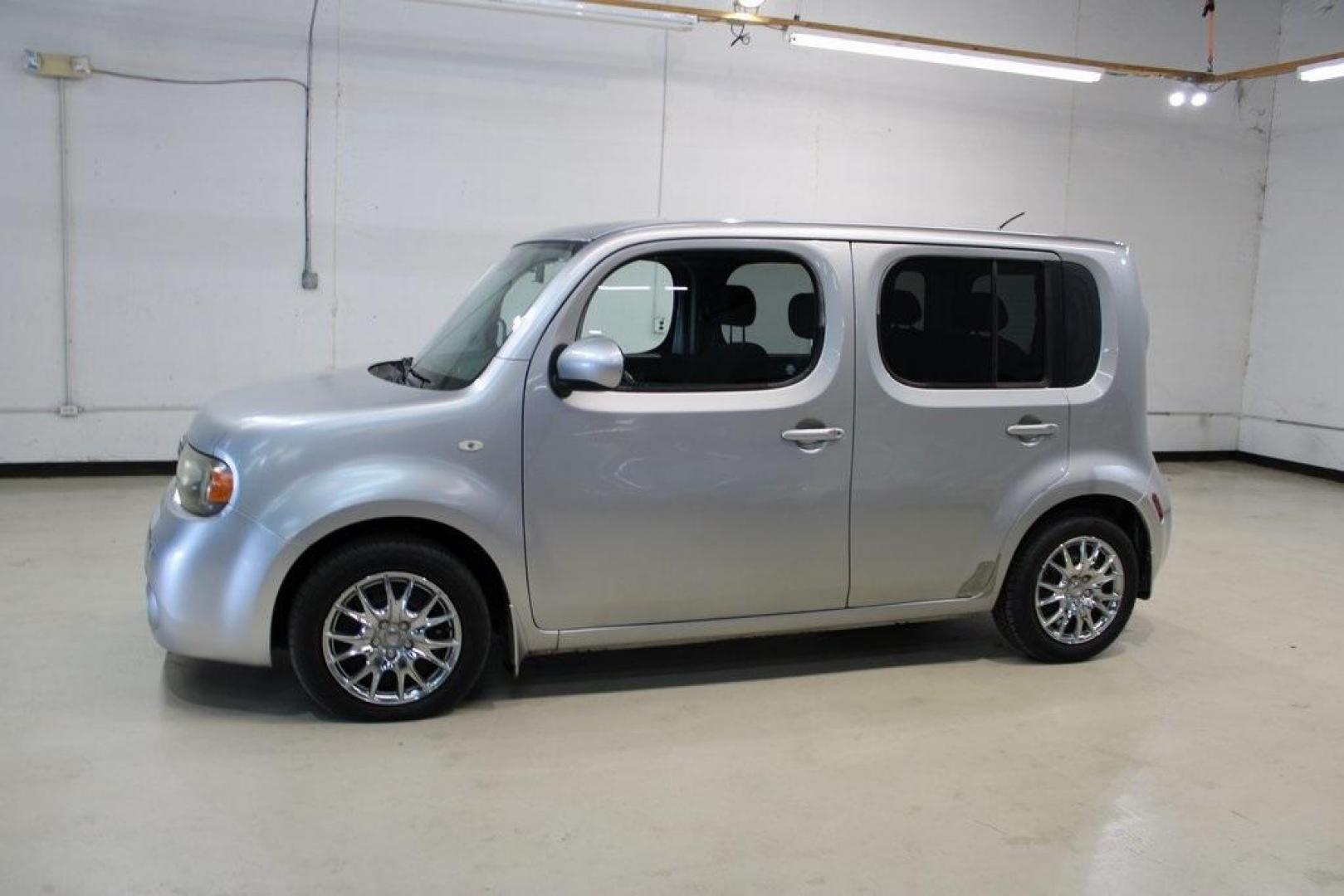 2011 Chrome Silver Metallic /Black Nissan Cube 1.8 S (JN8AZ2KRXBT) with an 1.8L 4-Cylinder DOHC 16V engine, CVT transmission, located at 15300 Midway Rd., Addison, TX, 75001, (972) 702-0011, 32.958321, -96.838074 - HOME OF THE NO HAGGLE PRICE - WHOLESALE PRICES TO THE PUBLIC!! Cube 1.8 S, 4D Wagon, 1.8L 4-Cylinder DOHC 16V, CVT with Xtronic, FWD, Chrome Silver Metallic, Black Cloth.<br><br>Chrome Silver Metallic 2011 Nissan Cube 1.8 S<br><br>27/31 City/Highway MPG<br><br>Awards:<br> * 2011 KBB.com Top 10 Cool - Photo#4