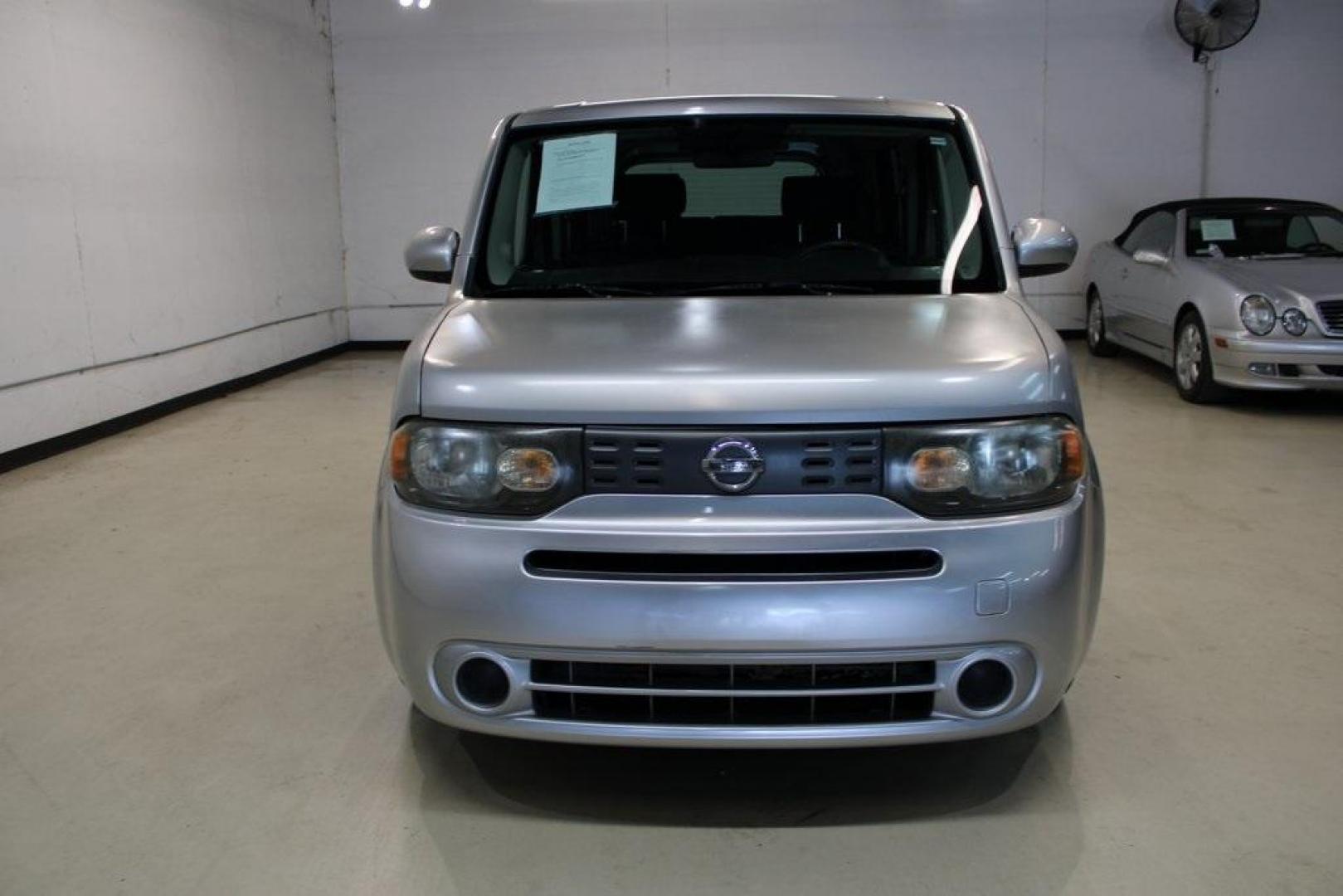 2011 Chrome Silver Metallic /Black Nissan Cube 1.8 S (JN8AZ2KRXBT) with an 1.8L 4-Cylinder DOHC 16V engine, CVT transmission, located at 15300 Midway Rd., Addison, TX, 75001, (972) 702-0011, 32.958321, -96.838074 - HOME OF THE NO HAGGLE PRICE - WHOLESALE PRICES TO THE PUBLIC!! Cube 1.8 S, 4D Wagon, 1.8L 4-Cylinder DOHC 16V, CVT with Xtronic, FWD, Chrome Silver Metallic, Black Cloth.<br><br>Chrome Silver Metallic 2011 Nissan Cube 1.8 S<br><br>27/31 City/Highway MPG<br><br>Awards:<br> * 2011 KBB.com Top 10 Cool - Photo#5