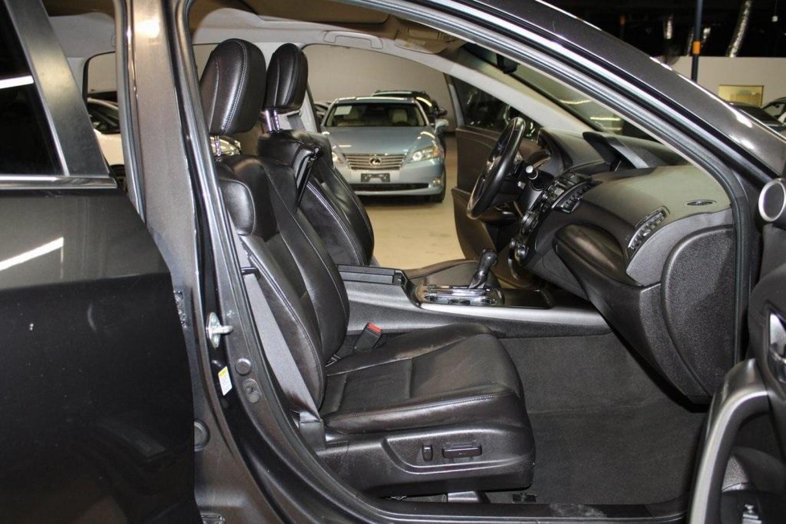 2015 Graphite Luster Metallic /Parchment Acura RDX Technology Package (5J8TB4H53FL) with an 3.5L V6 SOHC i-VTEC 24V engine, Automatic transmission, located at 15300 Midway Rd., Addison, TX, 75001, (972) 702-0011, 32.958321, -96.838074 - HOME OF THE NO HAGGLE PRICE - WHOLESALE PRICES TO THE PUBLIC!! RDX Technology Package, 4D Sport Utility, 3.5L V6 SOHC i-VTEC 24V, 6-Speed Automatic, AWD, Gray, Leather.<br><br>Gray 2015 Acura RDX Technology Package<br><br>19/27 City/Highway MPG<br><br>Awards:<br> * 2015 KBB.com 10 Best Luxury Cars - Photo#16