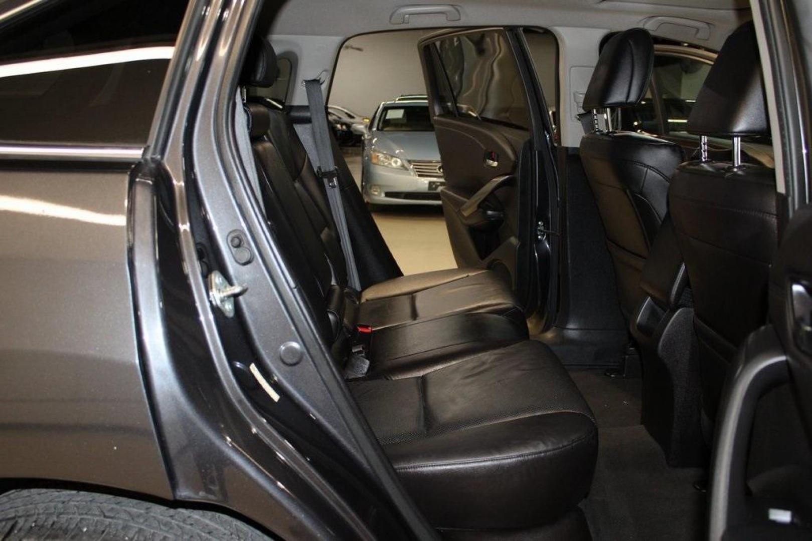 2015 Graphite Luster Metallic /Parchment Acura RDX Technology Package (5J8TB4H53FL) with an 3.5L V6 SOHC i-VTEC 24V engine, Automatic transmission, located at 15300 Midway Rd., Addison, TX, 75001, (972) 702-0011, 32.958321, -96.838074 - HOME OF THE NO HAGGLE PRICE - WHOLESALE PRICES TO THE PUBLIC!! RDX Technology Package, 4D Sport Utility, 3.5L V6 SOHC i-VTEC 24V, 6-Speed Automatic, AWD, Gray, Leather.<br><br>Gray 2015 Acura RDX Technology Package<br><br>19/27 City/Highway MPG<br><br>Awards:<br> * 2015 KBB.com 10 Best Luxury Cars - Photo#17