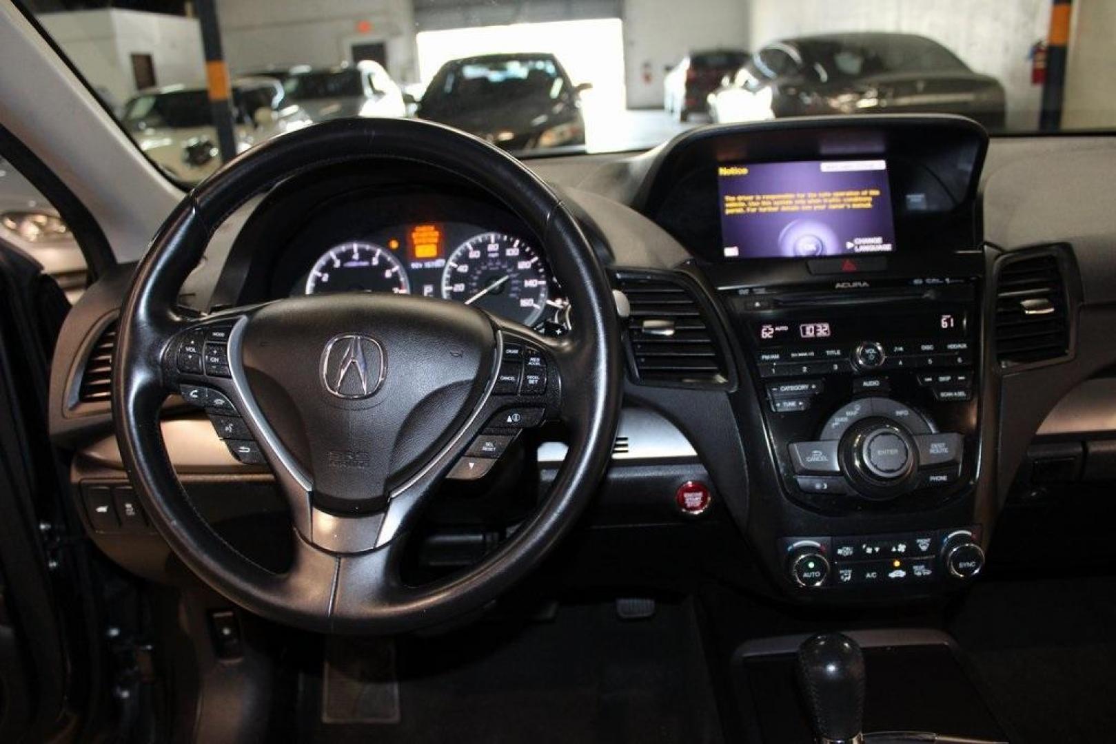 2015 Graphite Luster Metallic /Parchment Acura RDX Technology Package (5J8TB4H53FL) with an 3.5L V6 SOHC i-VTEC 24V engine, Automatic transmission, located at 15300 Midway Rd., Addison, TX, 75001, (972) 702-0011, 32.958321, -96.838074 - HOME OF THE NO HAGGLE PRICE - WHOLESALE PRICES TO THE PUBLIC!! RDX Technology Package, 4D Sport Utility, 3.5L V6 SOHC i-VTEC 24V, 6-Speed Automatic, AWD, Gray, Leather.<br><br>Gray 2015 Acura RDX Technology Package<br><br>19/27 City/Highway MPG<br><br>Awards:<br> * 2015 KBB.com 10 Best Luxury Cars - Photo#19