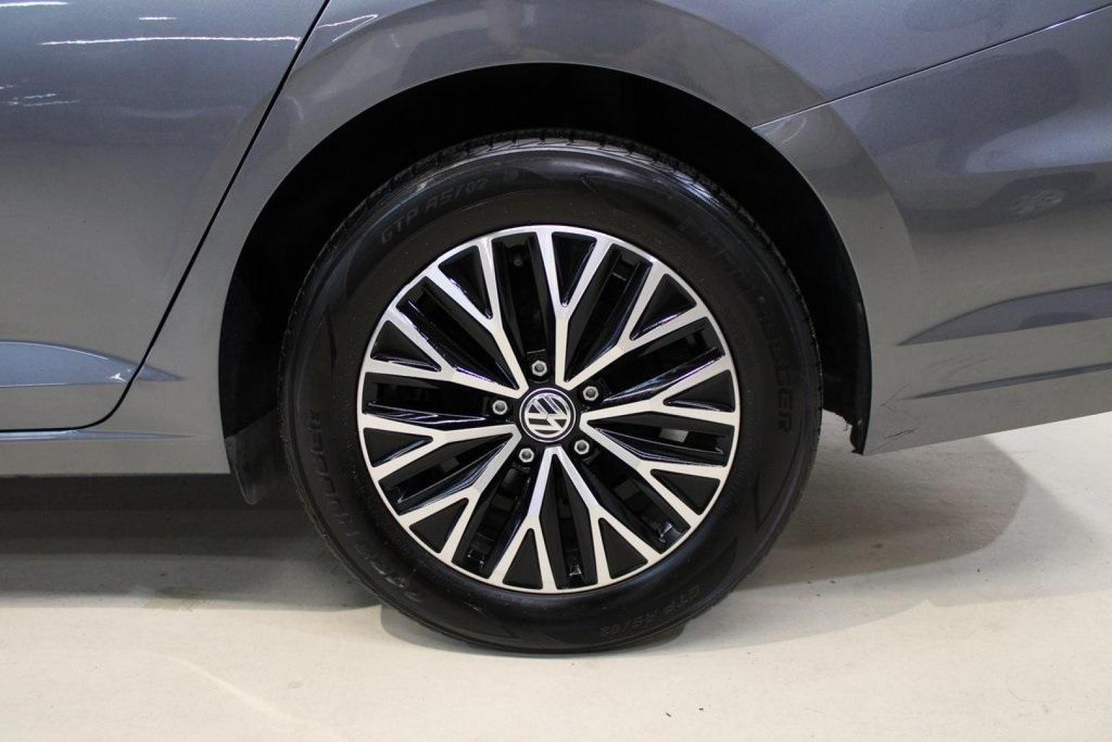 2021 Pyrite Silver Metallic /Storm Gray Volkswagen Jetta 1.4T S (3VWC57BU6MM) with an 1.4L TSI engine, Automatic transmission, located at 15300 Midway Rd., Addison, TX, 75001, (972) 702-0011, 32.958321, -96.838074 - HOME OF THE NO HAGGLE PRICE - WHOLESALE PRICES TO THE PUBLIC!! Jetta 1.4T S, 4D Sedan, 1.4L TSI, 8-Speed Automatic, FWD.<br><br>Pyrite Silver Metallic 2021 Volkswagen Jetta 1.4T S<br><br>29/39 City/Highway MPG<br><br><br>At Midway Auto Group, we strive to provide you with the best quality vehicles f - Photo#9