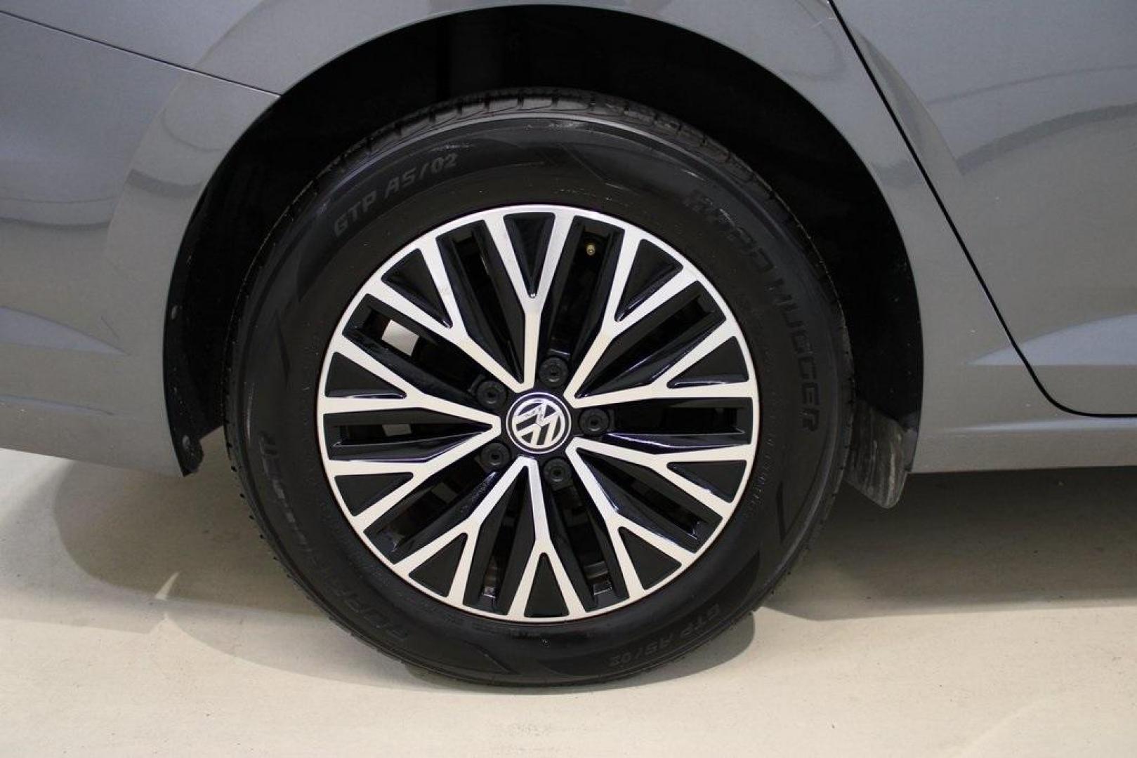 2021 Pyrite Silver Metallic /Storm Gray Volkswagen Jetta 1.4T S (3VWC57BU6MM) with an 1.4L TSI engine, Automatic transmission, located at 15300 Midway Rd., Addison, TX, 75001, (972) 702-0011, 32.958321, -96.838074 - HOME OF THE NO HAGGLE PRICE - WHOLESALE PRICES TO THE PUBLIC!! Jetta 1.4T S, 4D Sedan, 1.4L TSI, 8-Speed Automatic, FWD.<br><br>Pyrite Silver Metallic 2021 Volkswagen Jetta 1.4T S<br><br>29/39 City/Highway MPG<br><br><br>At Midway Auto Group, we strive to provide you with the best quality vehicles f - Photo#10