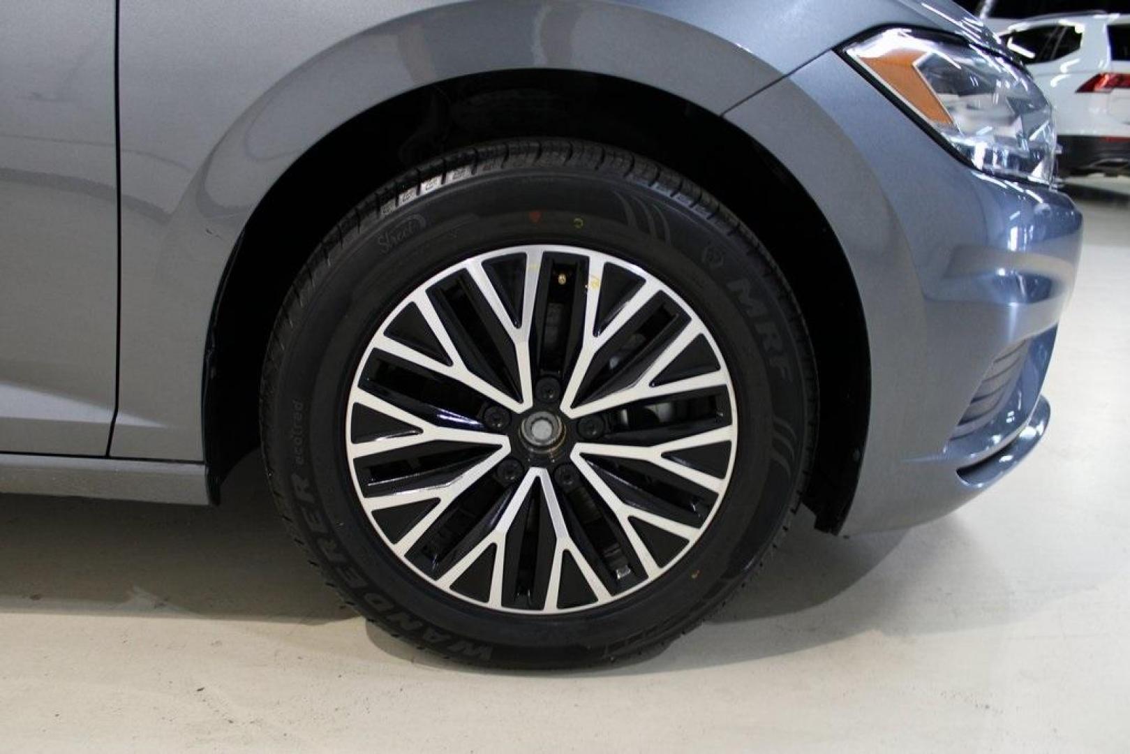 2021 Pyrite Silver Metallic /Storm Gray Volkswagen Jetta 1.4T S (3VWC57BU6MM) with an 1.4L TSI engine, Automatic transmission, located at 15300 Midway Rd., Addison, TX, 75001, (972) 702-0011, 32.958321, -96.838074 - HOME OF THE NO HAGGLE PRICE - WHOLESALE PRICES TO THE PUBLIC!! Jetta 1.4T S, 4D Sedan, 1.4L TSI, 8-Speed Automatic, FWD.<br><br>Pyrite Silver Metallic 2021 Volkswagen Jetta 1.4T S<br><br>29/39 City/Highway MPG<br><br><br>At Midway Auto Group, we strive to provide you with the best quality vehicles f - Photo#11