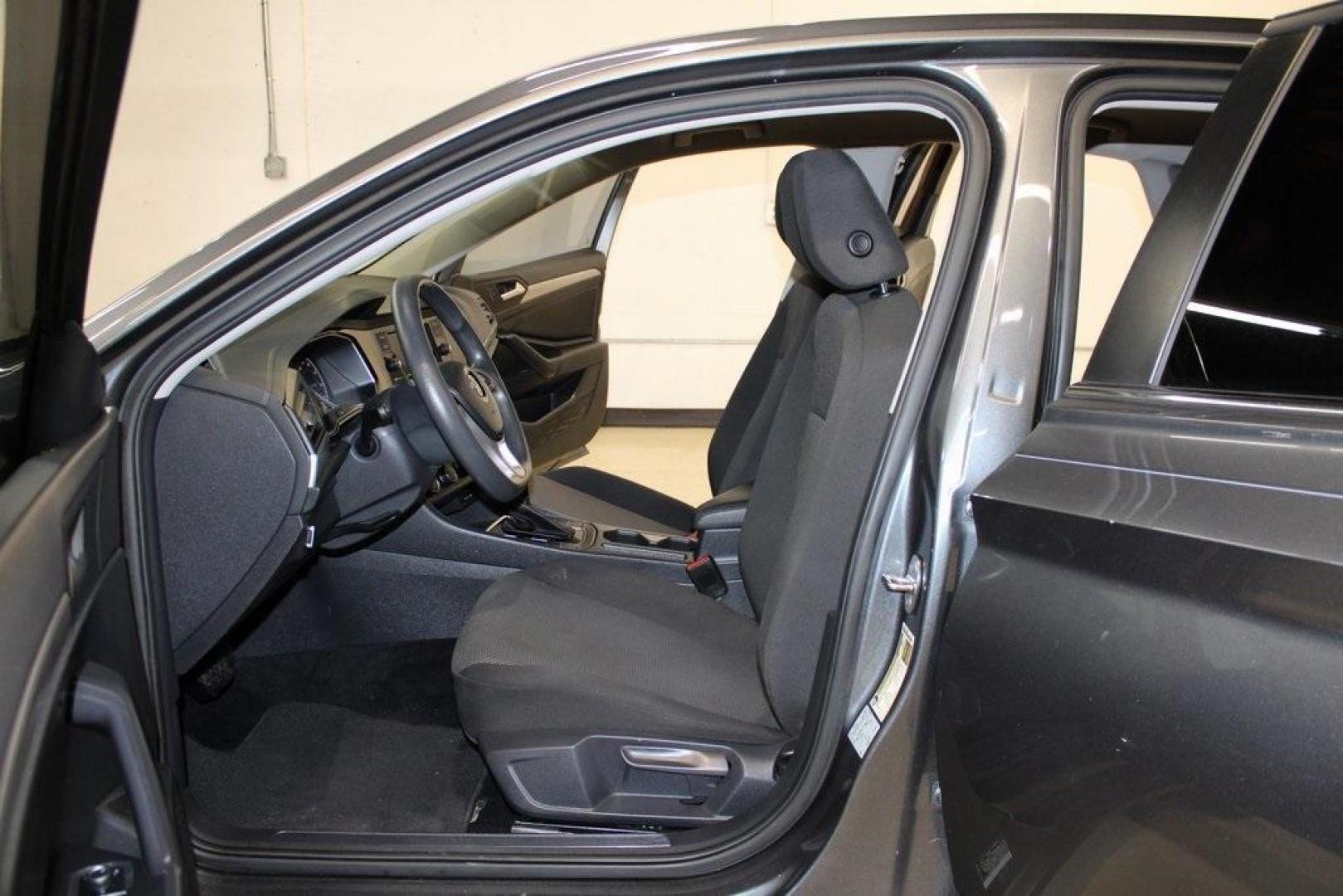 2021 Pyrite Silver Metallic /Storm Gray Volkswagen Jetta 1.4T S (3VWC57BU6MM) with an 1.4L TSI engine, Automatic transmission, located at 15300 Midway Rd., Addison, TX, 75001, (972) 702-0011, 32.958321, -96.838074 - HOME OF THE NO HAGGLE PRICE - WHOLESALE PRICES TO THE PUBLIC!! Jetta 1.4T S, 4D Sedan, 1.4L TSI, 8-Speed Automatic, FWD.<br><br>Pyrite Silver Metallic 2021 Volkswagen Jetta 1.4T S<br><br>29/39 City/Highway MPG<br><br><br>At Midway Auto Group, we strive to provide you with the best quality vehicles f - Photo#12