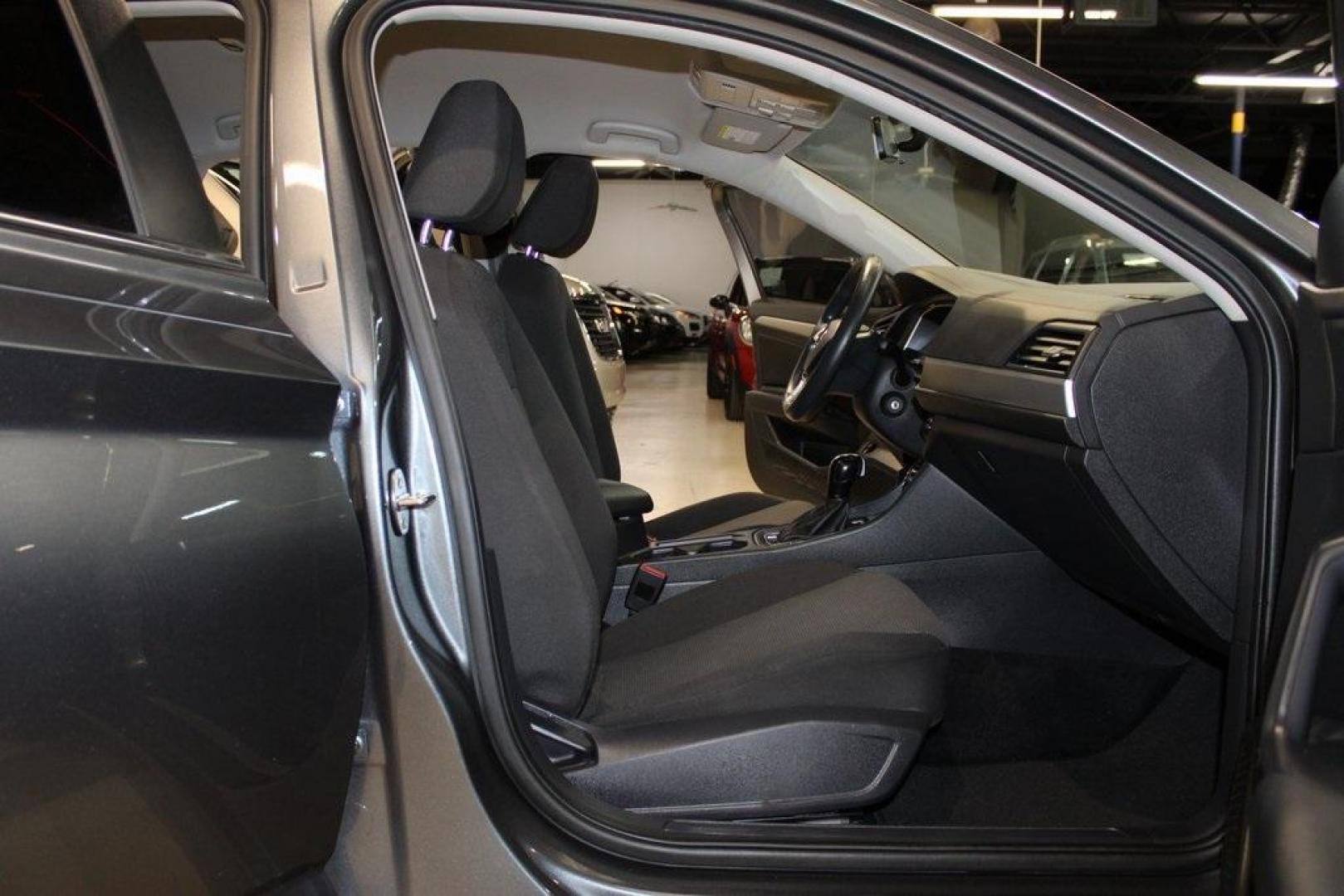 2021 Pyrite Silver Metallic /Storm Gray Volkswagen Jetta 1.4T S (3VWC57BU6MM) with an 1.4L TSI engine, Automatic transmission, located at 15300 Midway Rd., Addison, TX, 75001, (972) 702-0011, 32.958321, -96.838074 - HOME OF THE NO HAGGLE PRICE - WHOLESALE PRICES TO THE PUBLIC!! Jetta 1.4T S, 4D Sedan, 1.4L TSI, 8-Speed Automatic, FWD.<br><br>Pyrite Silver Metallic 2021 Volkswagen Jetta 1.4T S<br><br>29/39 City/Highway MPG<br><br><br>At Midway Auto Group, we strive to provide you with the best quality vehicles f - Photo#13