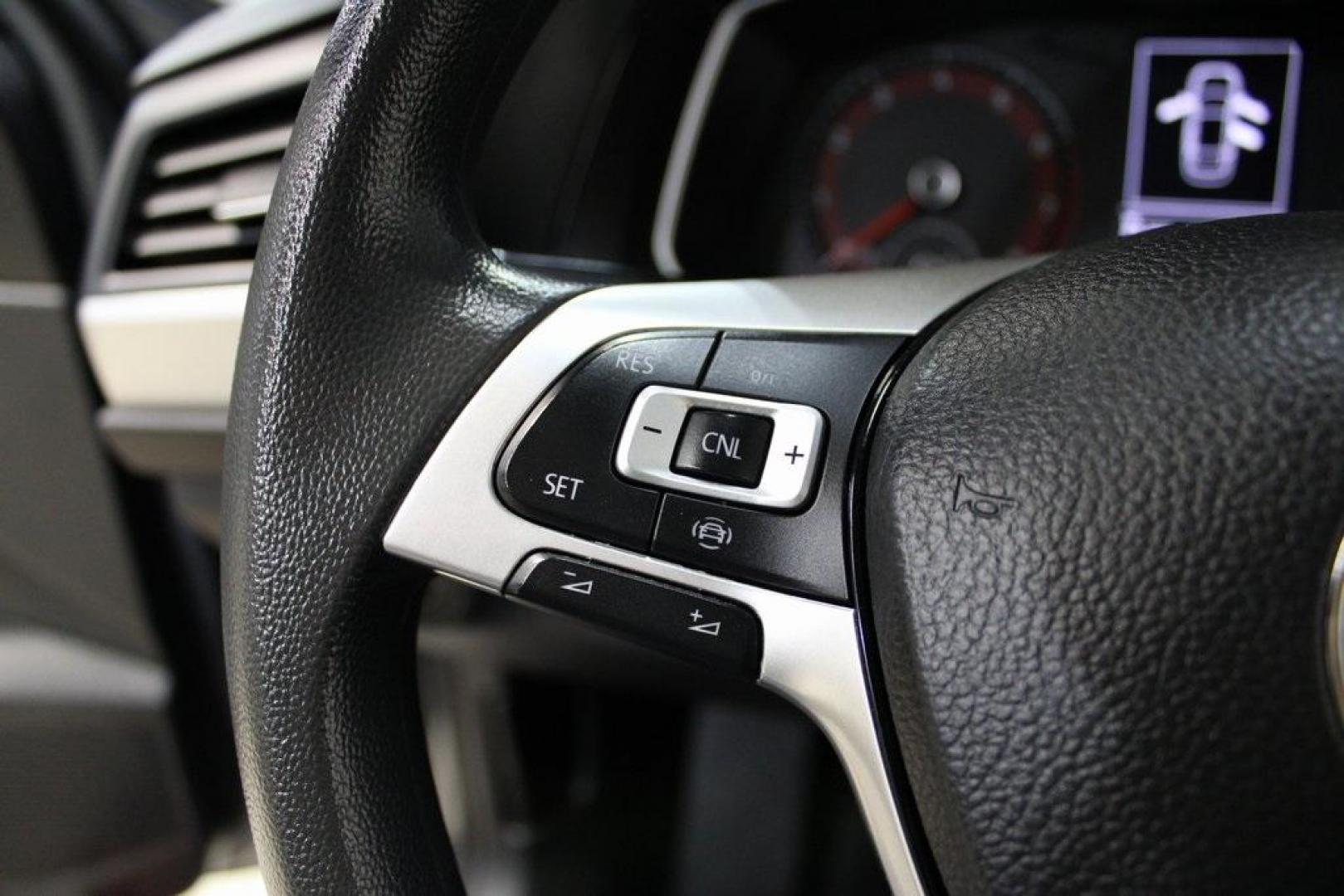2021 Pyrite Silver Metallic /Storm Gray Volkswagen Jetta 1.4T S (3VWC57BU6MM) with an 1.4L TSI engine, Automatic transmission, located at 15300 Midway Rd., Addison, TX, 75001, (972) 702-0011, 32.958321, -96.838074 - HOME OF THE NO HAGGLE PRICE - WHOLESALE PRICES TO THE PUBLIC!! Jetta 1.4T S, 4D Sedan, 1.4L TSI, 8-Speed Automatic, FWD.<br><br>Pyrite Silver Metallic 2021 Volkswagen Jetta 1.4T S<br><br>29/39 City/Highway MPG<br><br><br>At Midway Auto Group, we strive to provide you with the best quality vehicles f - Photo#22