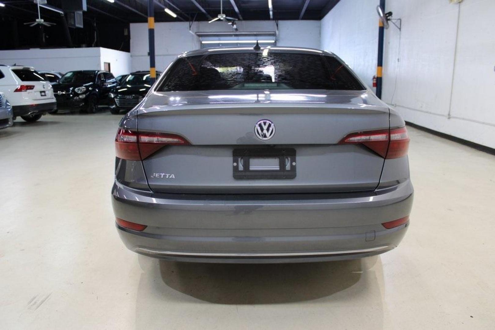 2021 Pyrite Silver Metallic /Storm Gray Volkswagen Jetta 1.4T S (3VWC57BU6MM) with an 1.4L TSI engine, Automatic transmission, located at 15300 Midway Rd., Addison, TX, 75001, (972) 702-0011, 32.958321, -96.838074 - HOME OF THE NO HAGGLE PRICE - WHOLESALE PRICES TO THE PUBLIC!! Jetta 1.4T S, 4D Sedan, 1.4L TSI, 8-Speed Automatic, FWD.<br><br>Pyrite Silver Metallic 2021 Volkswagen Jetta 1.4T S<br><br>29/39 City/Highway MPG<br><br><br>At Midway Auto Group, we strive to provide you with the best quality vehicles f - Photo#7