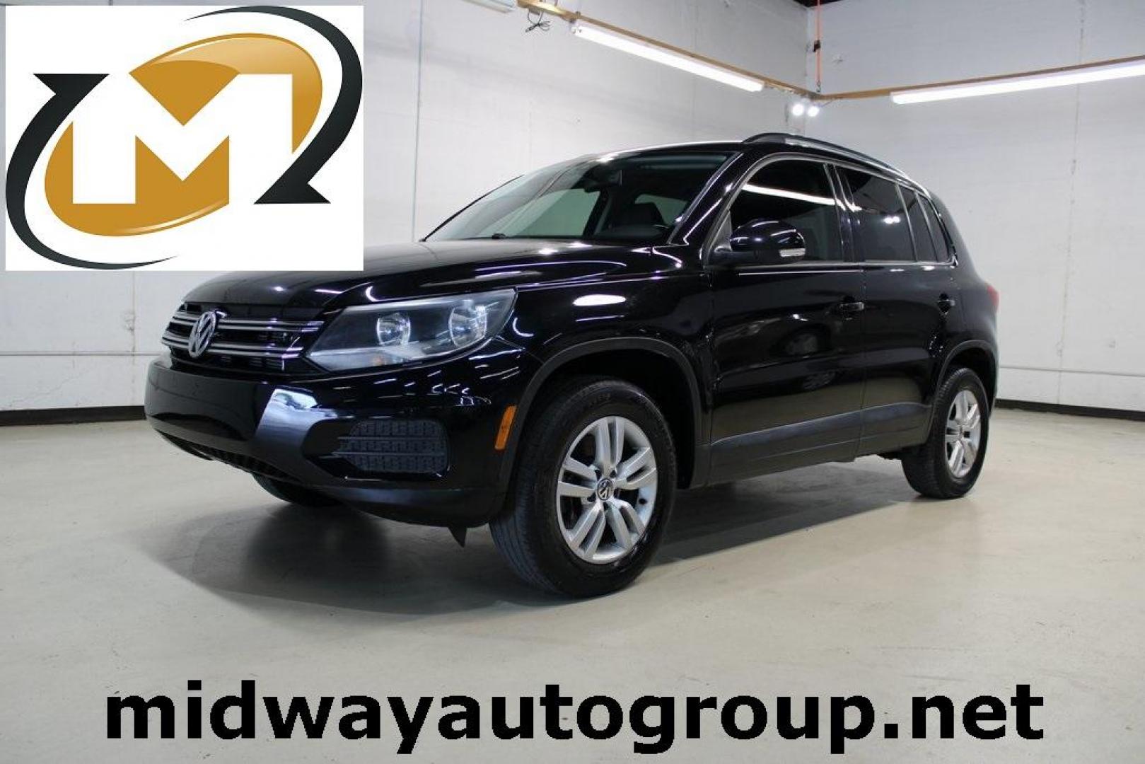 2017 Deep Black /Charcoal Black Volkswagen Tiguan 2.0T S (WVGAV7AX3HK) with an 2.0L TSI DOHC engine, Automatic transmission, located at 15300 Midway Rd., Addison, TX, 75001, (972) 702-0011, 32.958321, -96.838074 - HOME OF THE NO HAGGLE PRICE - WHOLESALE PRICES TO THE PUBLIC!! Tiguan 2.0T S, 4D Sport Utility, 2.0L TSI DOHC, 6-Speed Automatic with Tiptronic, FWD, Black, Charcoal Black w/V-Tex Leatherette Seating Surfaces.<br><br>Black 2017 Volkswagen Tiguan 2.0T S<br><br><br>At Midway Auto Group, we strive to p - Photo#0