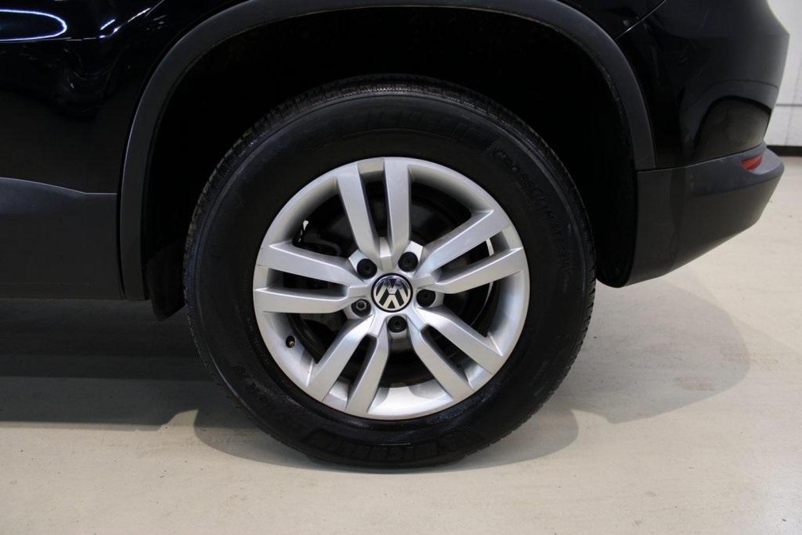 2017 Deep Black /Charcoal Black Volkswagen Tiguan 2.0T S (WVGAV7AX3HK) with an 2.0L TSI DOHC engine, Automatic transmission, located at 15300 Midway Rd., Addison, TX, 75001, (972) 702-0011, 32.958321, -96.838074 - HOME OF THE NO HAGGLE PRICE - WHOLESALE PRICES TO THE PUBLIC!! Tiguan 2.0T S, 4D Sport Utility, 2.0L TSI DOHC, 6-Speed Automatic with Tiptronic, FWD, Black, Charcoal Black w/V-Tex Leatherette Seating Surfaces.<br><br>Black 2017 Volkswagen Tiguan 2.0T S<br><br><br>At Midway Auto Group, we strive to p - Photo#9