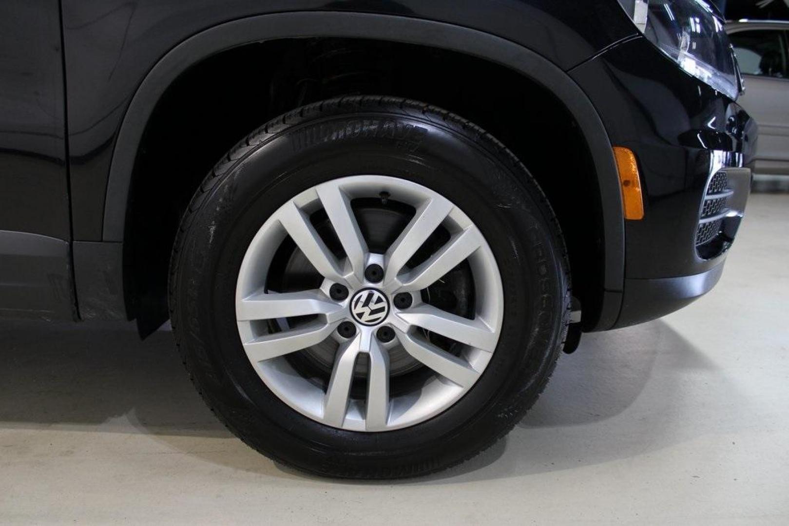 2017 Deep Black /Charcoal Black Volkswagen Tiguan 2.0T S (WVGAV7AX3HK) with an 2.0L TSI DOHC engine, Automatic transmission, located at 15300 Midway Rd., Addison, TX, 75001, (972) 702-0011, 32.958321, -96.838074 - HOME OF THE NO HAGGLE PRICE - WHOLESALE PRICES TO THE PUBLIC!! Tiguan 2.0T S, 4D Sport Utility, 2.0L TSI DOHC, 6-Speed Automatic with Tiptronic, FWD, Black, Charcoal Black w/V-Tex Leatherette Seating Surfaces.<br><br>Black 2017 Volkswagen Tiguan 2.0T S<br><br><br>At Midway Auto Group, we strive to p - Photo#11