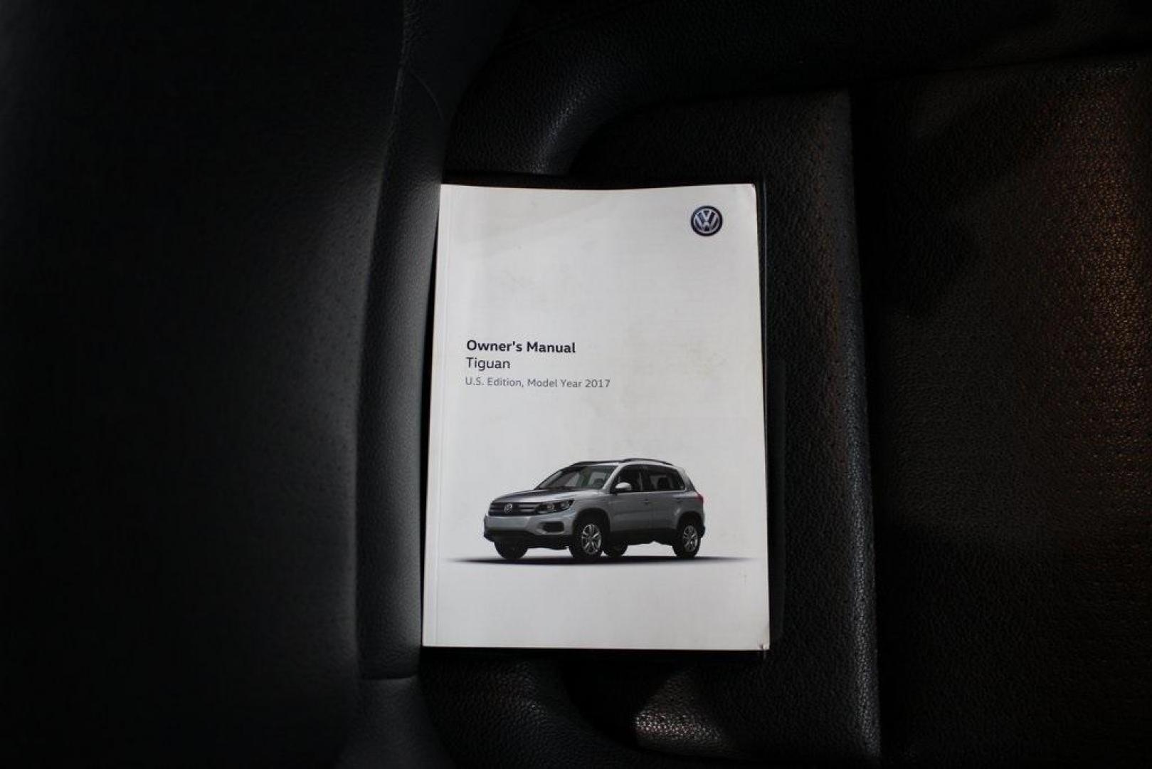 2017 Deep Black /Charcoal Black Volkswagen Tiguan 2.0T S (WVGAV7AX3HK) with an 2.0L TSI DOHC engine, Automatic transmission, located at 15300 Midway Rd., Addison, TX, 75001, (972) 702-0011, 32.958321, -96.838074 - HOME OF THE NO HAGGLE PRICE - WHOLESALE PRICES TO THE PUBLIC!! Tiguan 2.0T S, 4D Sport Utility, 2.0L TSI DOHC, 6-Speed Automatic with Tiptronic, FWD, Black, Charcoal Black w/V-Tex Leatherette Seating Surfaces.<br><br>Black 2017 Volkswagen Tiguan 2.0T S<br><br><br>At Midway Auto Group, we strive to p - Photo#12