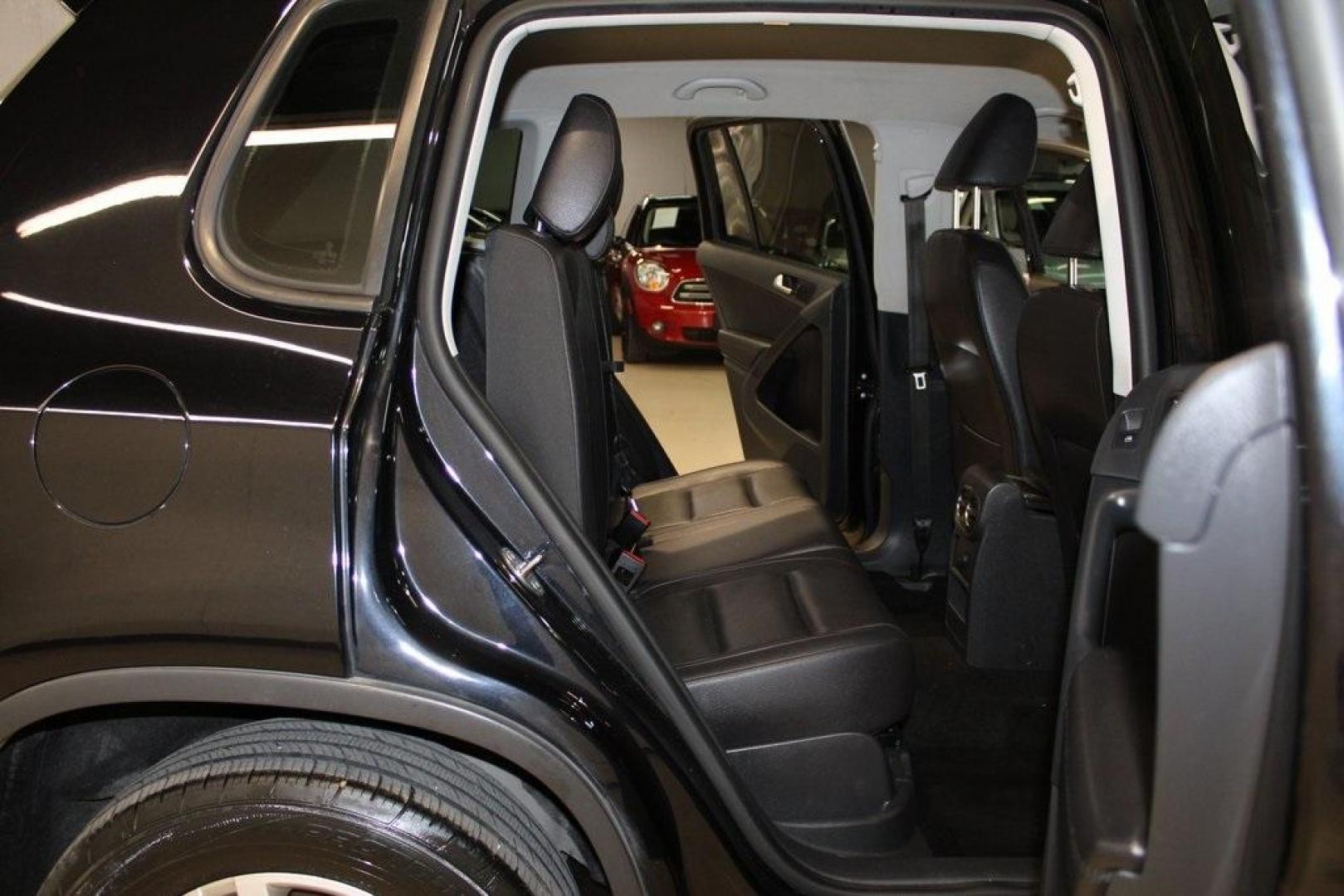 2017 Deep Black /Charcoal Black Volkswagen Tiguan 2.0T S (WVGAV7AX3HK) with an 2.0L TSI DOHC engine, Automatic transmission, located at 15300 Midway Rd., Addison, TX, 75001, (972) 702-0011, 32.958321, -96.838074 - HOME OF THE NO HAGGLE PRICE - WHOLESALE PRICES TO THE PUBLIC!! Tiguan 2.0T S, 4D Sport Utility, 2.0L TSI DOHC, 6-Speed Automatic with Tiptronic, FWD, Black, Charcoal Black w/V-Tex Leatherette Seating Surfaces.<br><br>Black 2017 Volkswagen Tiguan 2.0T S<br><br><br>At Midway Auto Group, we strive to p - Photo#15