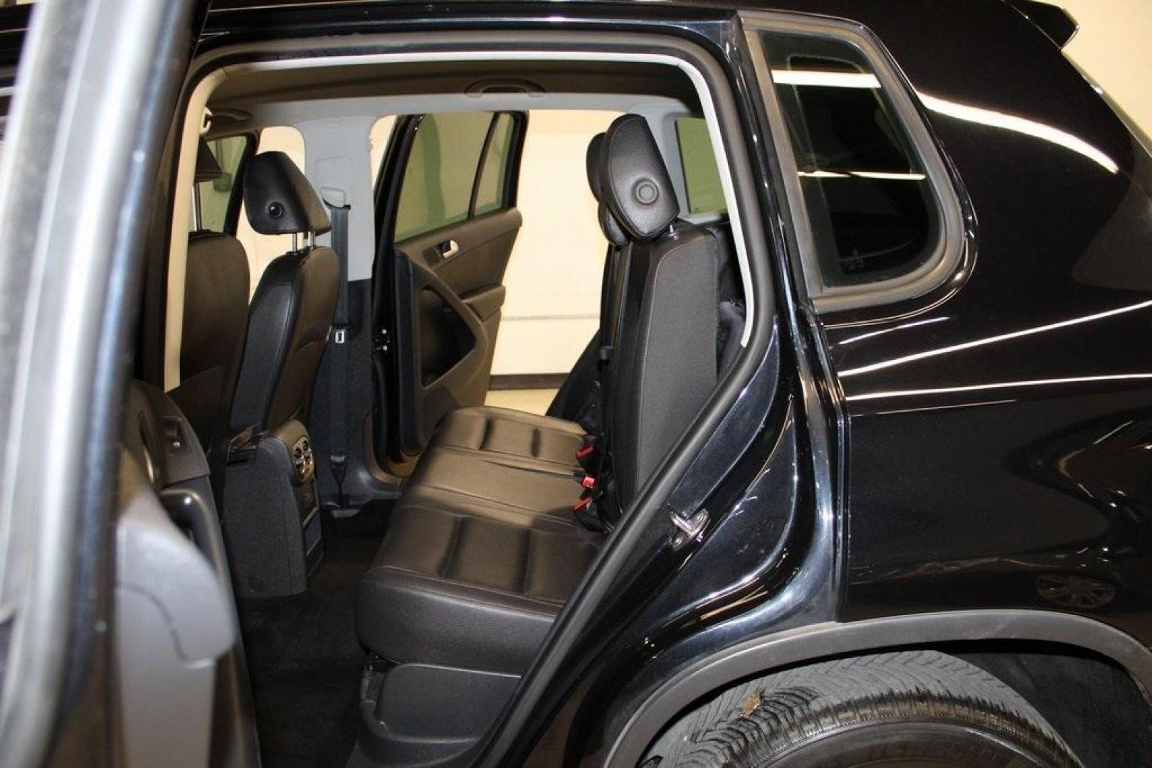 2017 Deep Black /Charcoal Black Volkswagen Tiguan 2.0T S (WVGAV7AX3HK) with an 2.0L TSI DOHC engine, Automatic transmission, located at 15300 Midway Rd., Addison, TX, 75001, (972) 702-0011, 32.958321, -96.838074 - HOME OF THE NO HAGGLE PRICE - WHOLESALE PRICES TO THE PUBLIC!! Tiguan 2.0T S, 4D Sport Utility, 2.0L TSI DOHC, 6-Speed Automatic with Tiptronic, FWD, Black, Charcoal Black w/V-Tex Leatherette Seating Surfaces.<br><br>Black 2017 Volkswagen Tiguan 2.0T S<br><br><br>At Midway Auto Group, we strive to p - Photo#16