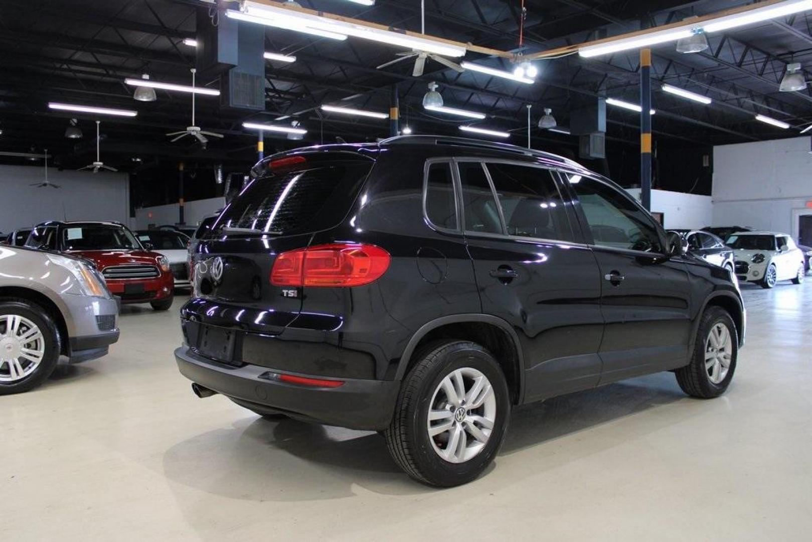 2017 Deep Black /Charcoal Black Volkswagen Tiguan 2.0T S (WVGAV7AX3HK) with an 2.0L TSI DOHC engine, Automatic transmission, located at 15300 Midway Rd., Addison, TX, 75001, (972) 702-0011, 32.958321, -96.838074 - HOME OF THE NO HAGGLE PRICE - WHOLESALE PRICES TO THE PUBLIC!! Tiguan 2.0T S, 4D Sport Utility, 2.0L TSI DOHC, 6-Speed Automatic with Tiptronic, FWD, Black, Charcoal Black w/V-Tex Leatherette Seating Surfaces.<br><br>Black 2017 Volkswagen Tiguan 2.0T S<br><br><br>At Midway Auto Group, we strive to p - Photo#2