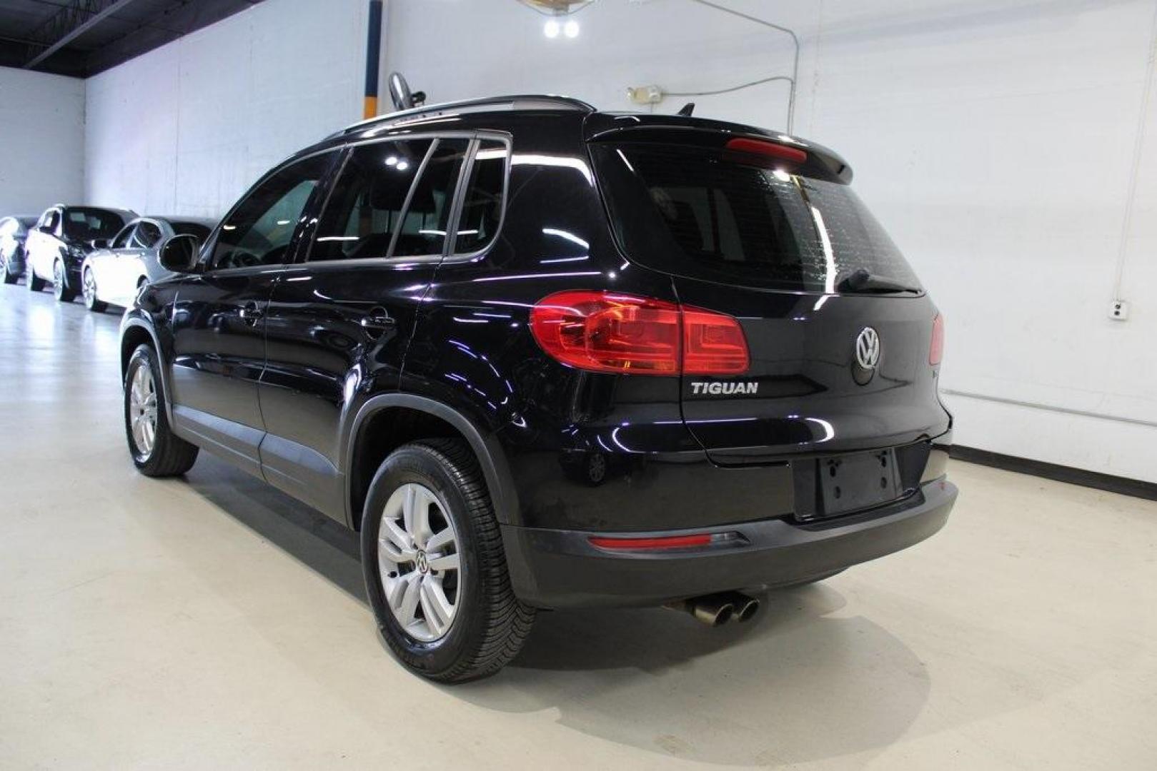 2017 Deep Black /Charcoal Black Volkswagen Tiguan 2.0T S (WVGAV7AX3HK) with an 2.0L TSI DOHC engine, Automatic transmission, located at 15300 Midway Rd., Addison, TX, 75001, (972) 702-0011, 32.958321, -96.838074 - HOME OF THE NO HAGGLE PRICE - WHOLESALE PRICES TO THE PUBLIC!! Tiguan 2.0T S, 4D Sport Utility, 2.0L TSI DOHC, 6-Speed Automatic with Tiptronic, FWD, Black, Charcoal Black w/V-Tex Leatherette Seating Surfaces.<br><br>Black 2017 Volkswagen Tiguan 2.0T S<br><br><br>At Midway Auto Group, we strive to p - Photo#3