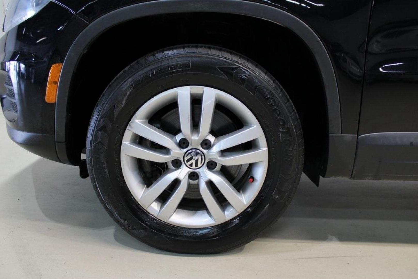 2017 Deep Black /Charcoal Black Volkswagen Tiguan 2.0T S (WVGAV7AX3HK) with an 2.0L TSI DOHC engine, Automatic transmission, located at 15300 Midway Rd., Addison, TX, 75001, (972) 702-0011, 32.958321, -96.838074 - HOME OF THE NO HAGGLE PRICE - WHOLESALE PRICES TO THE PUBLIC!! Tiguan 2.0T S, 4D Sport Utility, 2.0L TSI DOHC, 6-Speed Automatic with Tiptronic, FWD, Black, Charcoal Black w/V-Tex Leatherette Seating Surfaces.<br><br>Black 2017 Volkswagen Tiguan 2.0T S<br><br><br>At Midway Auto Group, we strive to p - Photo#8