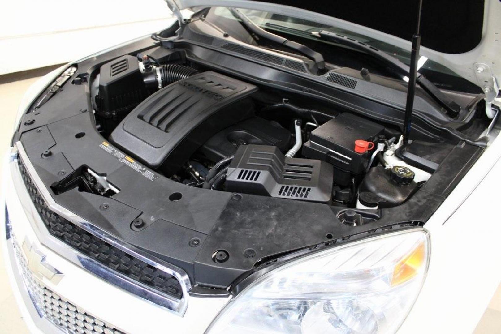 2014 White Diamond Tricoat /Jet Black Chevrolet Equinox LT (1GNALBEK5EZ) with an 2.4L 4-Cylinder SIDI DOHC engine, Automatic transmission, located at 15300 Midway Rd., Addison, TX, 75001, (972) 702-0011, 32.958321, -96.838074 - Introducing the 2014 Chevrolet Equinox LT 1LT, now available at Midway Auto Group in Addison, Texas. This versatile SUV offers a comfortable ride, ample space, and modern features, making it an excellent choice for families and individuals alike.<br><br>Key Features:<br><br>Engine: 2.4L 4-Cylinder S - Photo#25