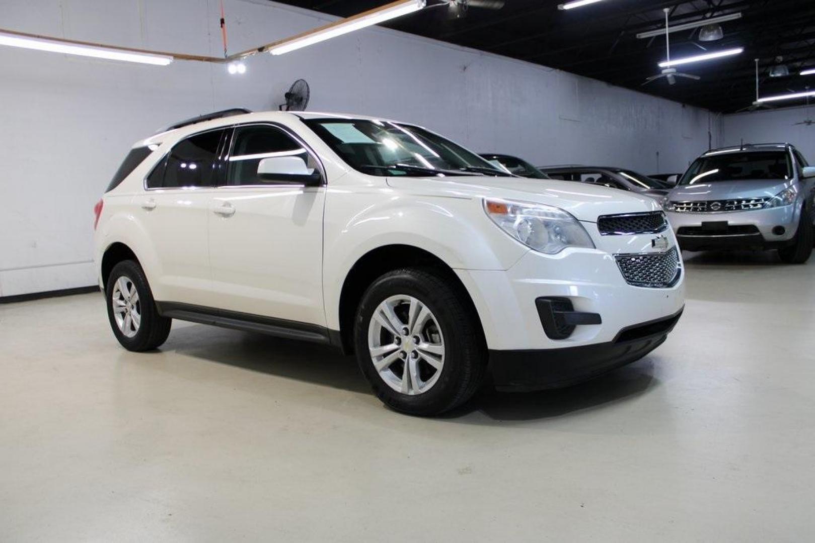 2014 White Diamond Tricoat /Jet Black Chevrolet Equinox LT (1GNALBEK5EZ) with an 2.4L 4-Cylinder SIDI DOHC engine, Automatic transmission, located at 15300 Midway Rd., Addison, TX, 75001, (972) 702-0011, 32.958321, -96.838074 - Introducing the 2014 Chevrolet Equinox LT 1LT, now available at Midway Auto Group in Addison, Texas. This versatile SUV offers a comfortable ride, ample space, and modern features, making it an excellent choice for families and individuals alike.<br><br>Key Features:<br><br>Engine: 2.4L 4-Cylinder S - Photo#6